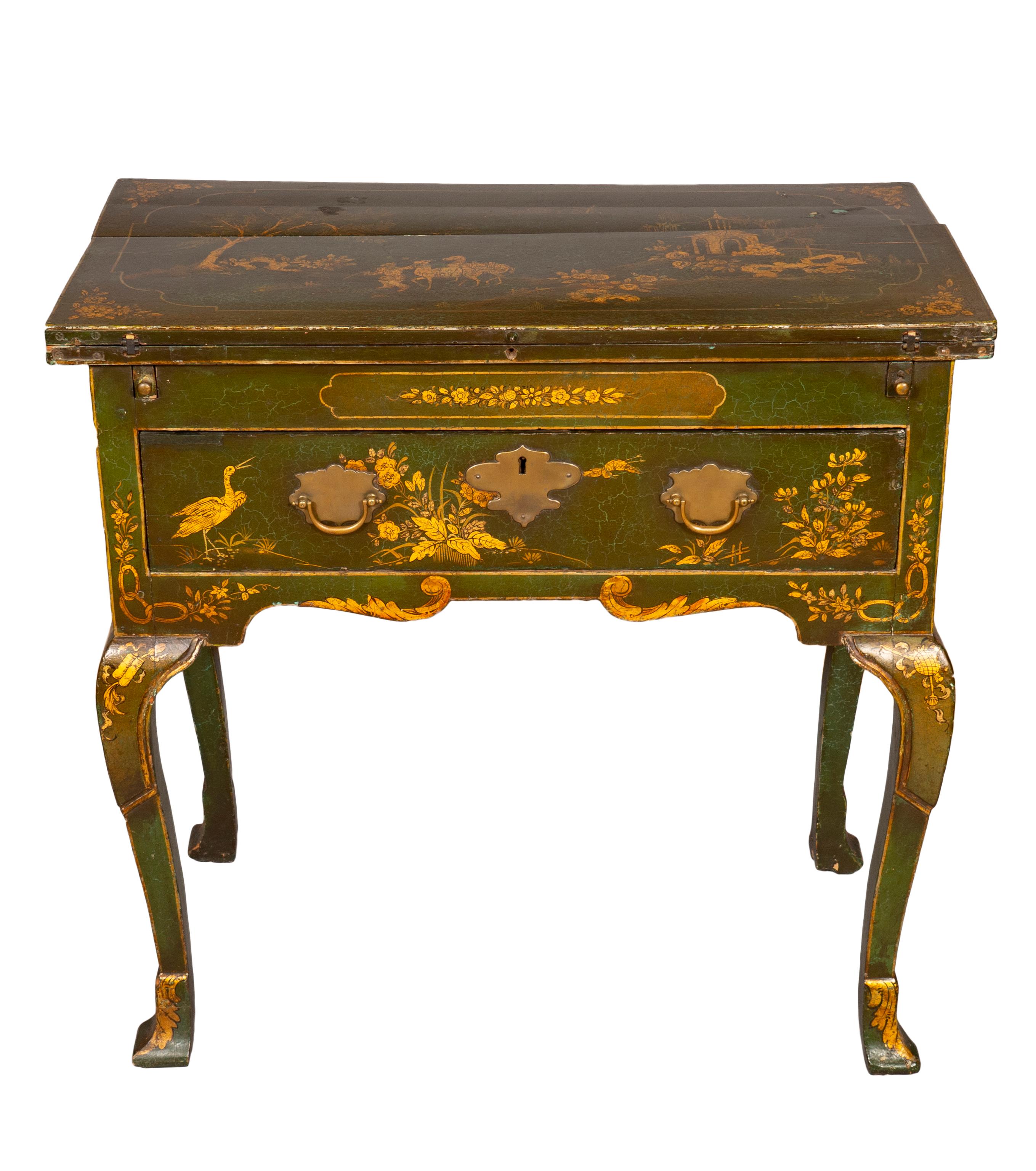 With possible later painted decoration. With a great look and nice appearance.
The rectangular top with a fold over top to form a writing surface over a frieze with a single drawer, raised on cabriole legs and trifid feet. From a Newport RI Estate.