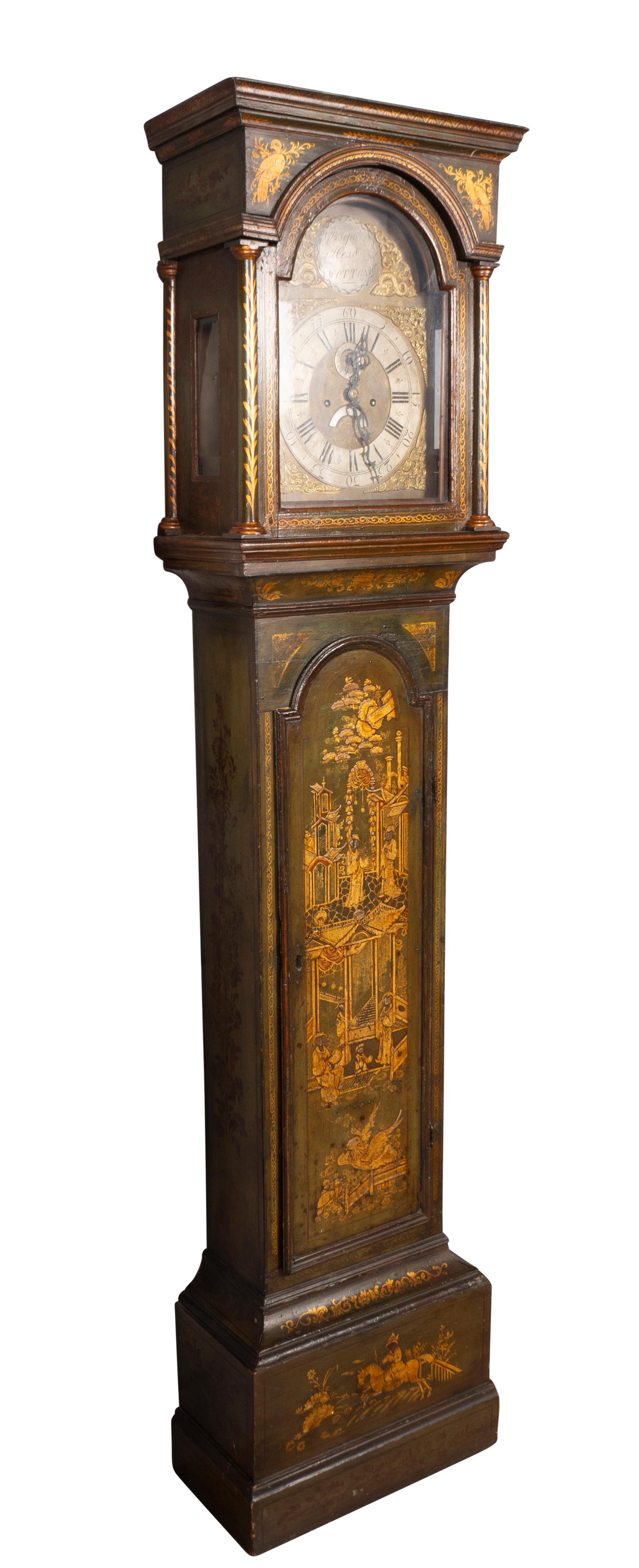By Joseph Head from Wotton Surrey. Flat top over a glazed door opening to a brass clock works all redone and ready for install. The case with a beautiful subtle green and gilt chinoiserie decoration. With pendulum and weights. Chimes the hour. Seven