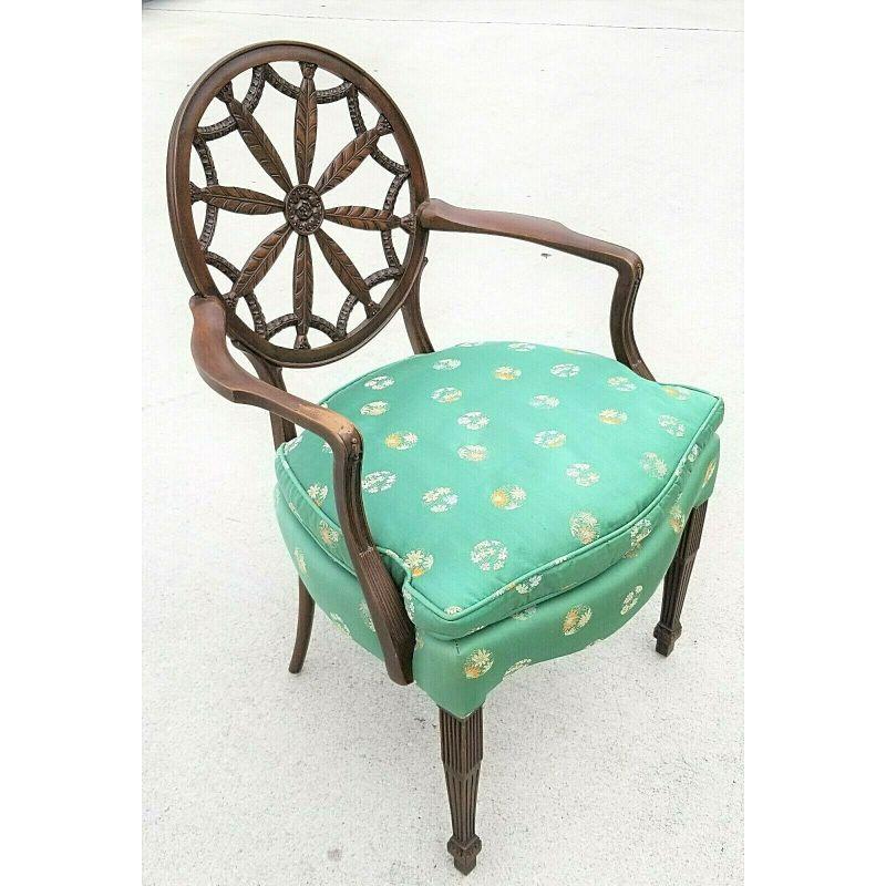 For FULL item description be sure to click on CONTINUE READING at the bottom of this listing.

Offering One Of Our Recent Palm Beach Estate Fine Furniture Acquisitions Of A 
George III Style Mahogany Hepplewhite Period Wheel Back Open Elbow Armchair