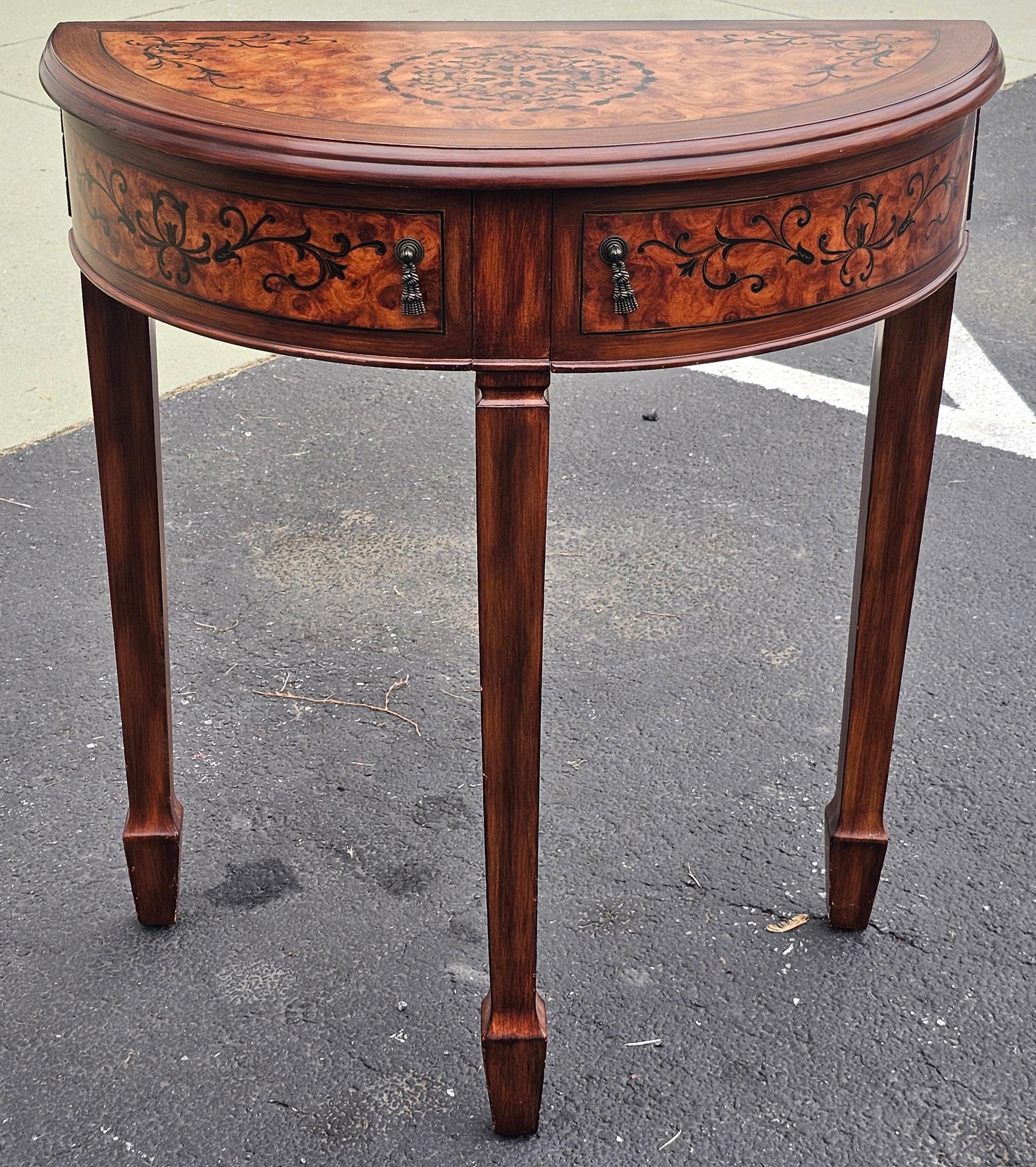 A George III Inlaid Burlwood Style Demilune two-drawer Console Table
Measures 28