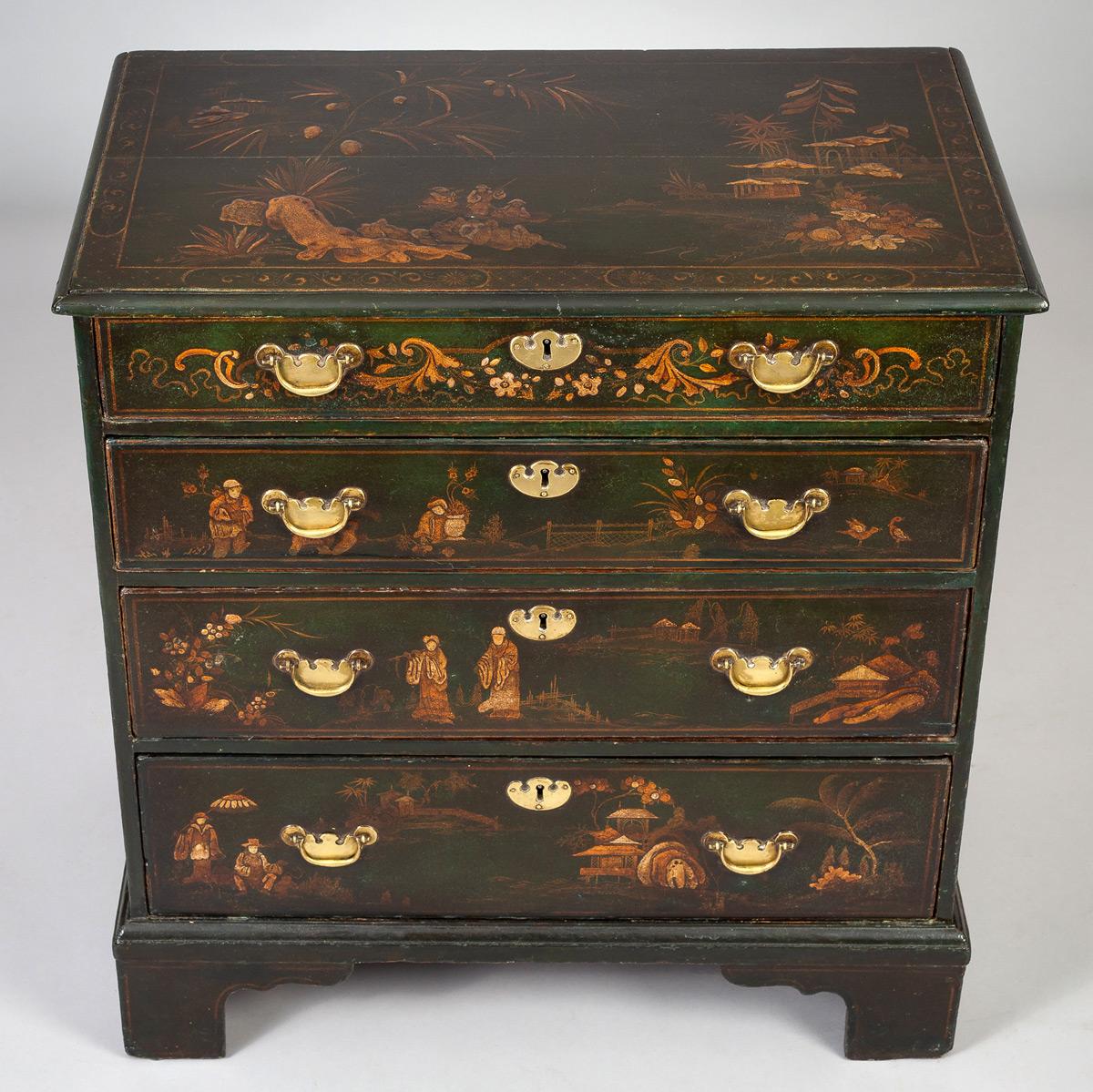 George III small Japanned and gilded chest with four graduated drawers, the top, front and sides decorated with chinoiserie figures, trees, pagodas, rockery and boats on a green background with original brass hardware and escutcheons, raised on