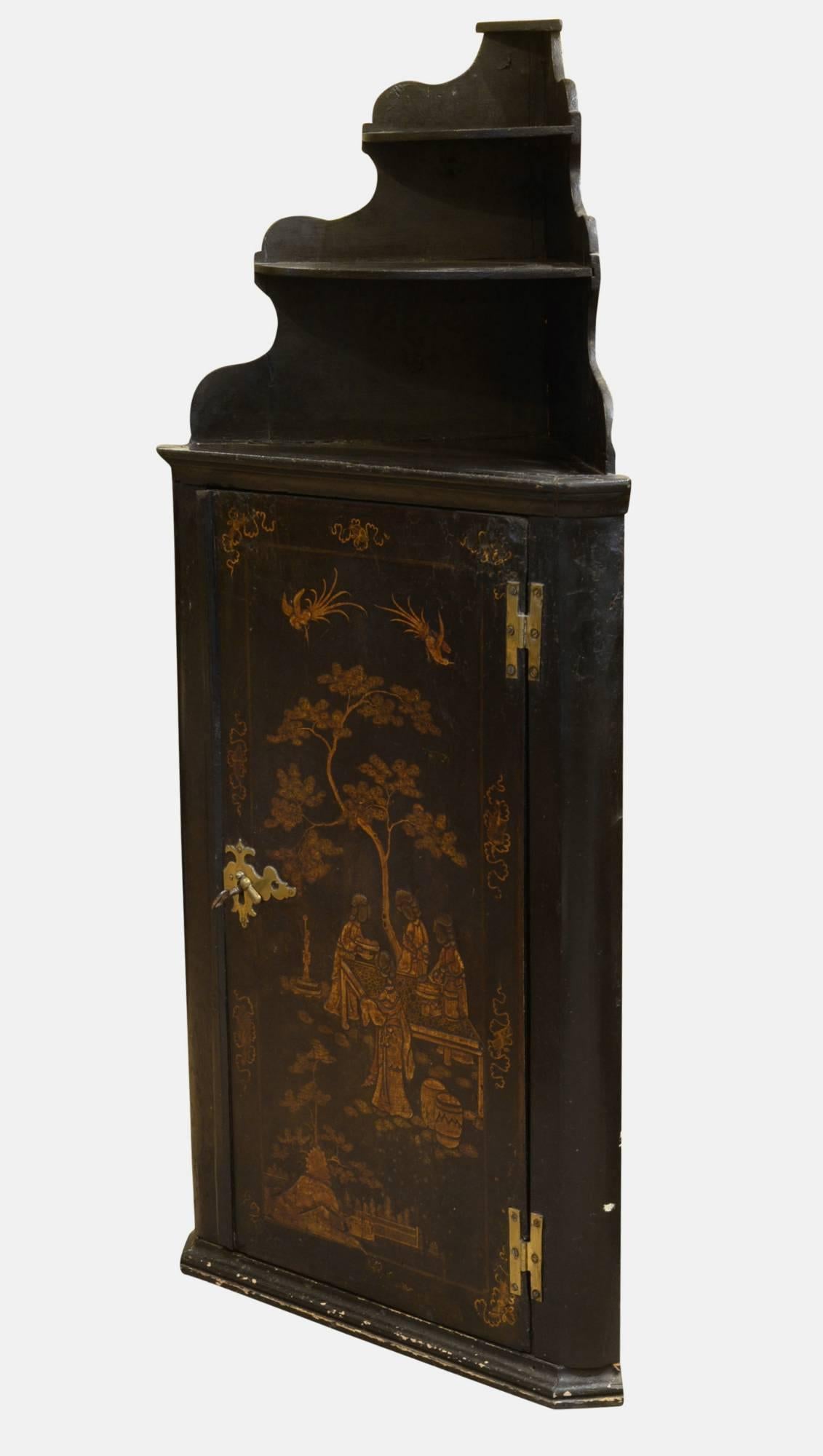 A George III lacquered corner cabinet.

circa 1790.
     