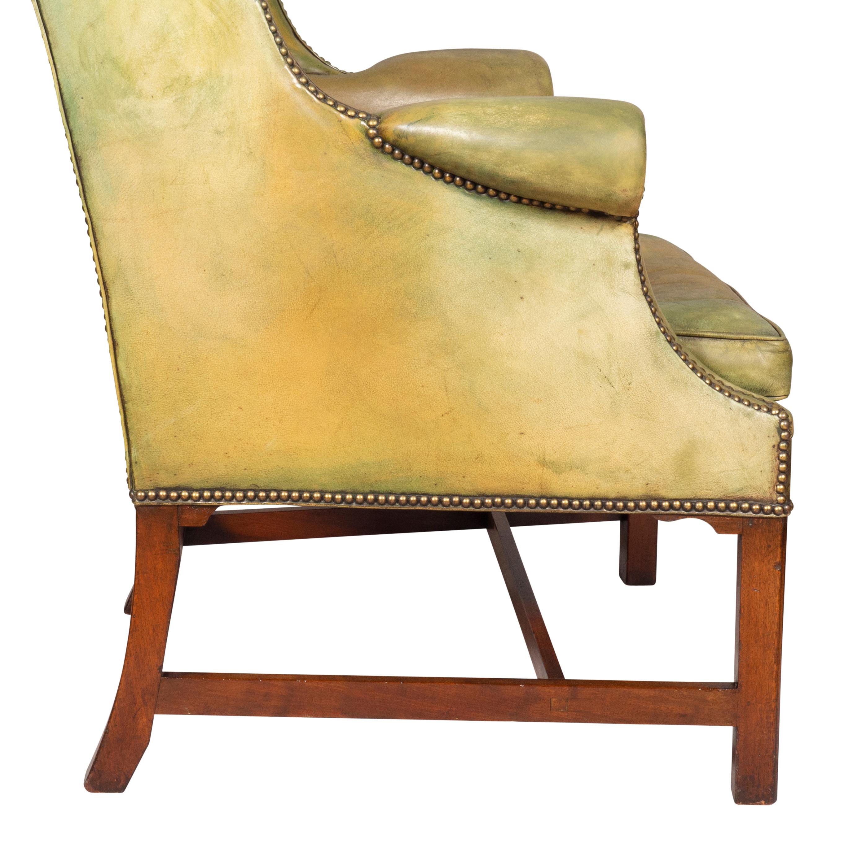 George III Mahogany and Leather Wing Chair 4