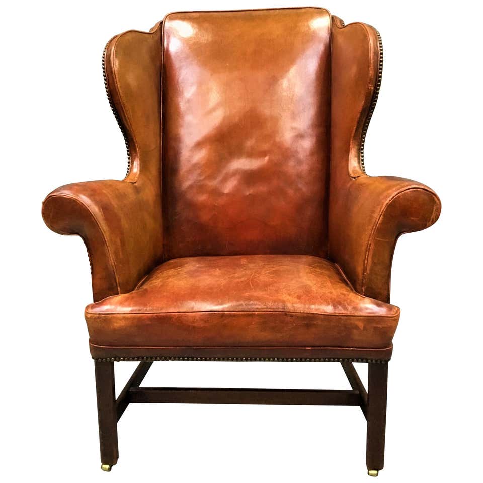 Vintage Orange Leather Wing Chair at 1stdibs