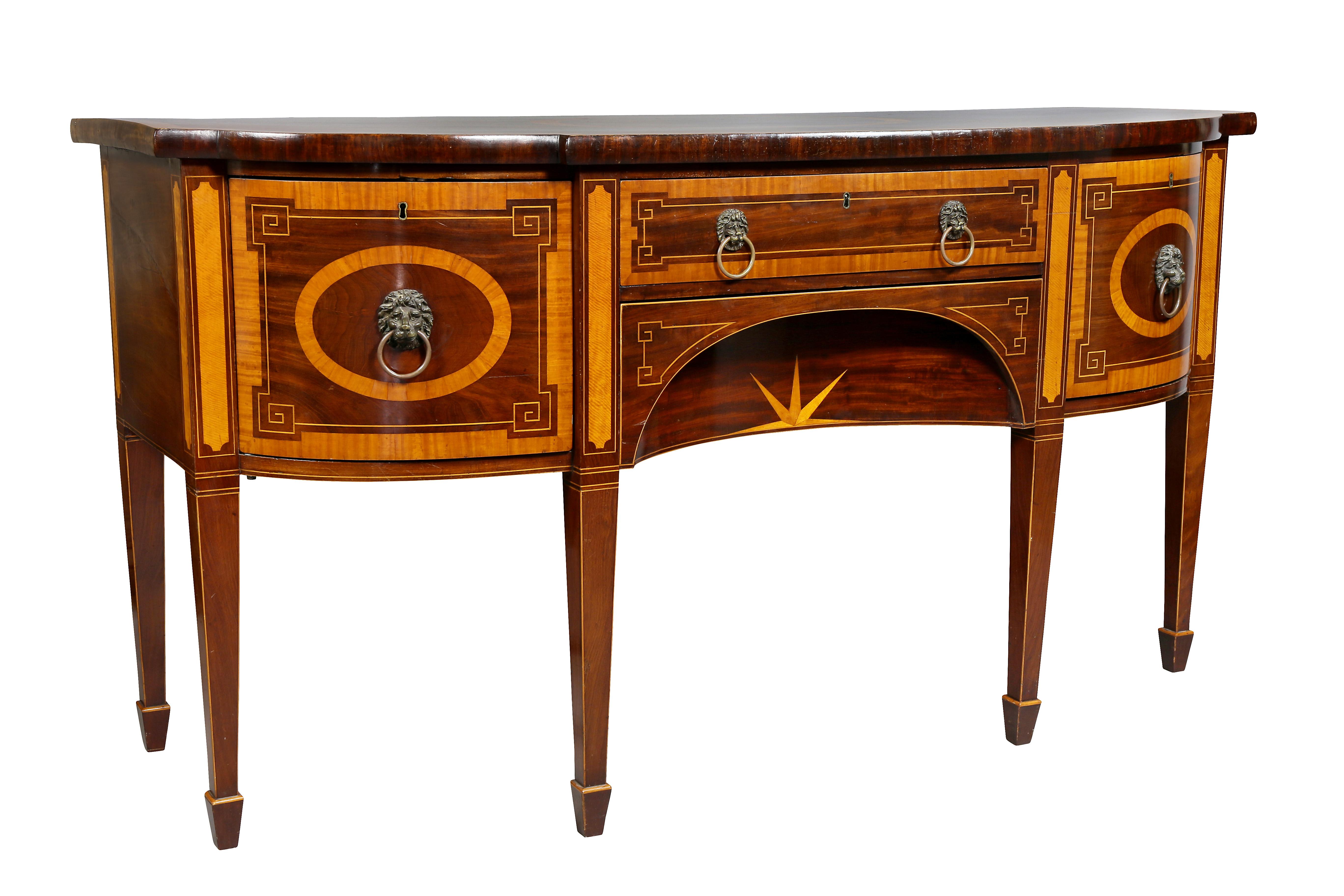 Bowed top with squared corners and central oval inlay and banded edge over a pair of cabinet doors and a central drawer and lower drawer with sunburst inlay, raised on square tapered legs, spade feet.