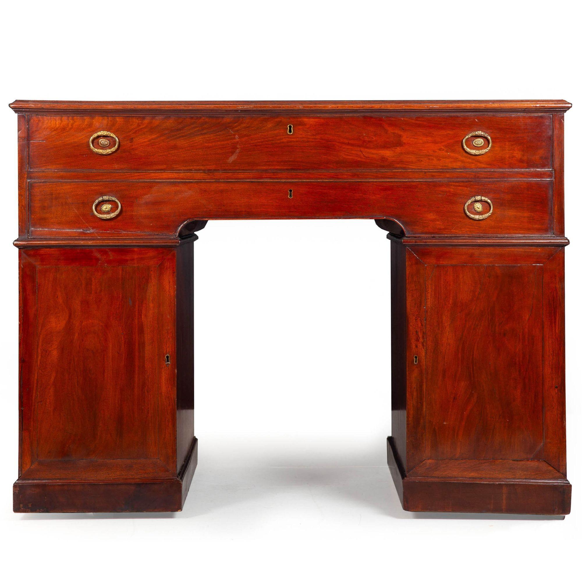 GEORGE III MAHOGANY ARCHITECT'S DESK IN MANNER OF GILLOWS OF LANCASTER
England, circa 1790  with alphabetized rent drawers interior  unmarked
Item # 405KYH28Z

This remarkable architect's pedestal desk was almost certainly crafted by Gillows of