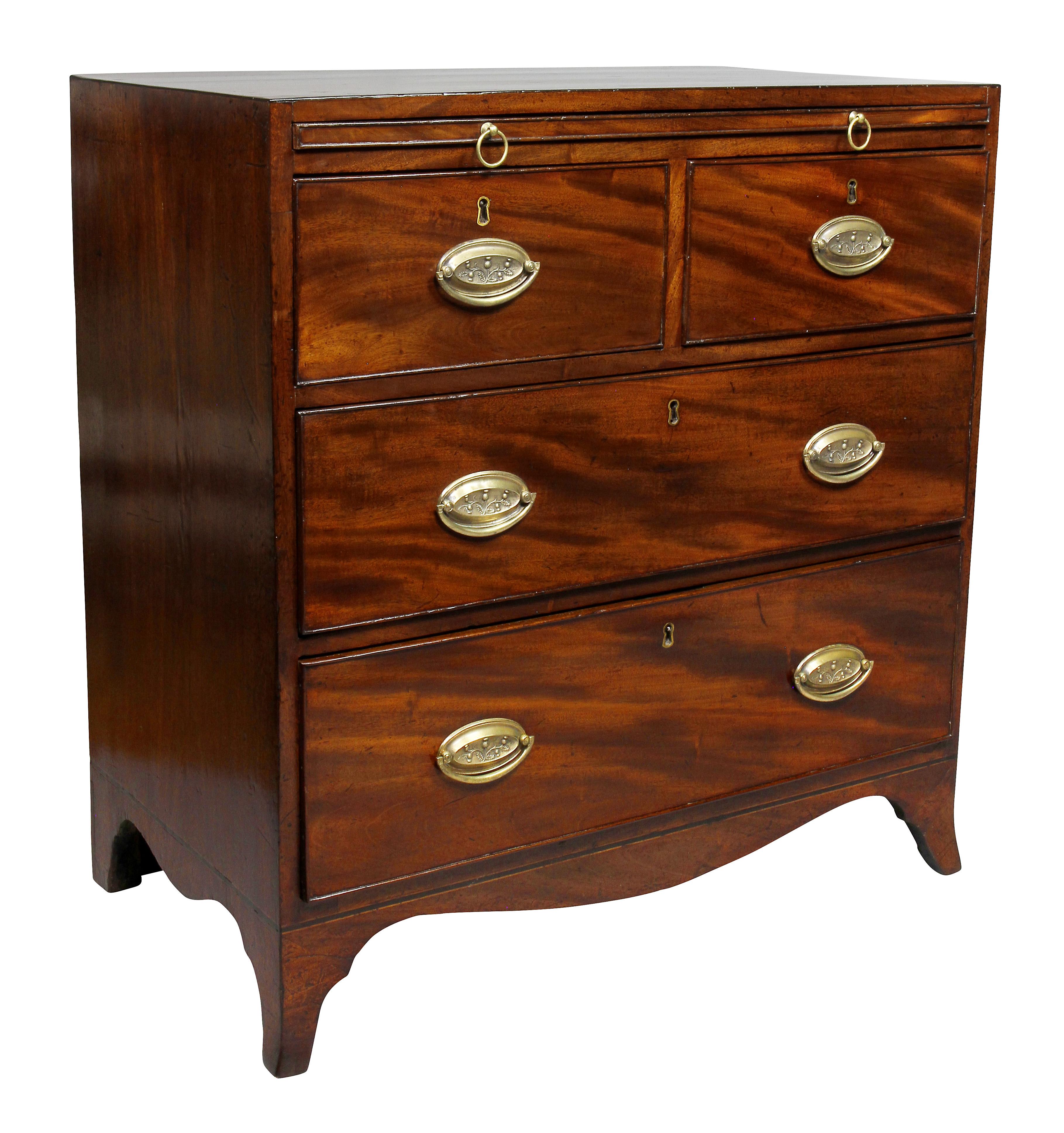 Rectangular crossbanded top over a brushing slide with ring handles over two over two long drawers, splayed feet.
 