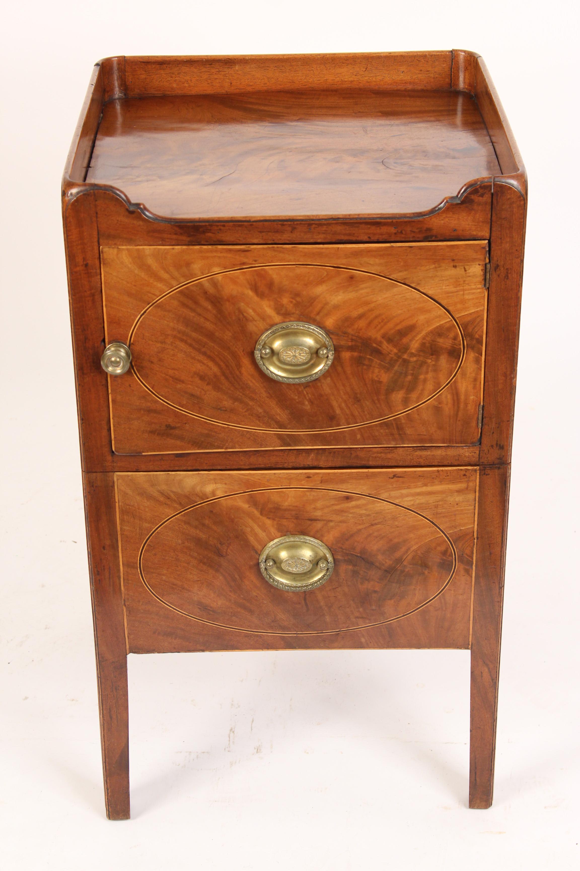 George III mahogany bedside commode, circa 1800. With nice quality flame mahogany used on front and top of commode. Measures: The overall height is 30
