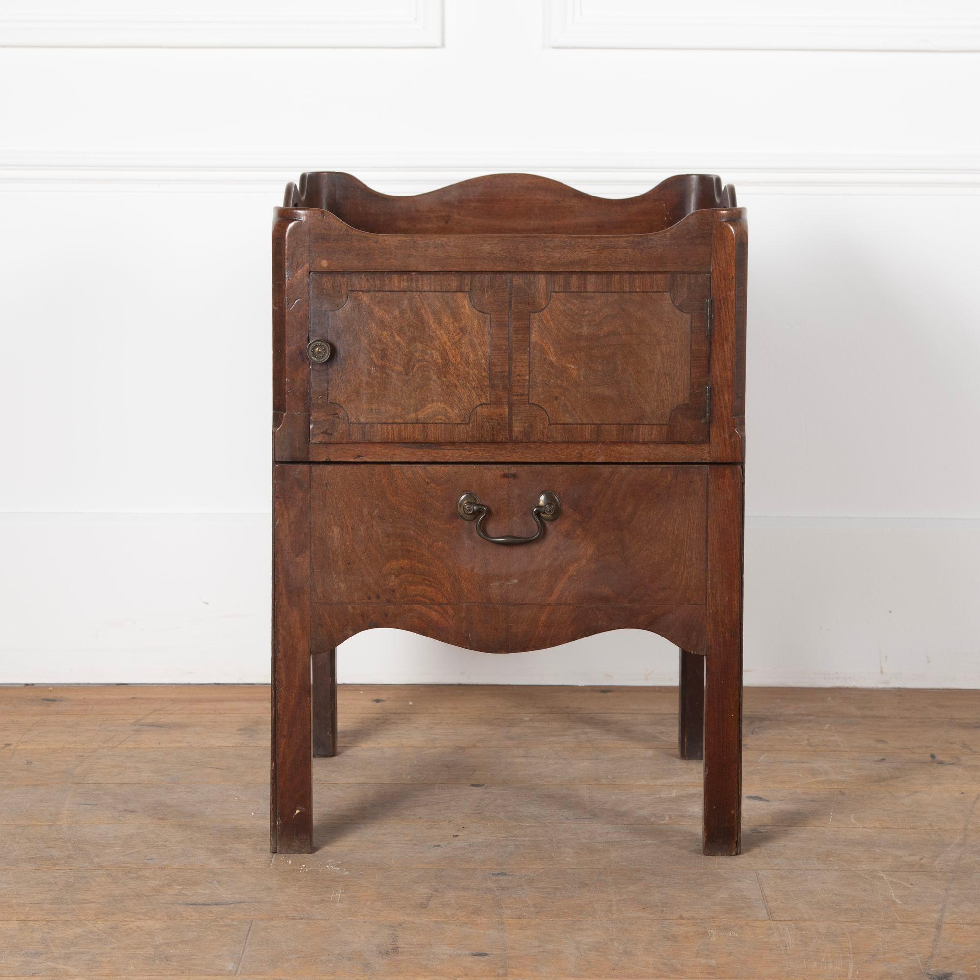 George III mahogany bedside cupboard with pull-out drawer, formerly a commode.
The cupboard compartment has had a new base fitted to it, and the pull-out section which had a commode fitted has now been altered to accommodate a new drawer.
The drawer
