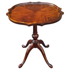 George III Mahogany Bookmatched Pedestal Quadfeet Tea Table
