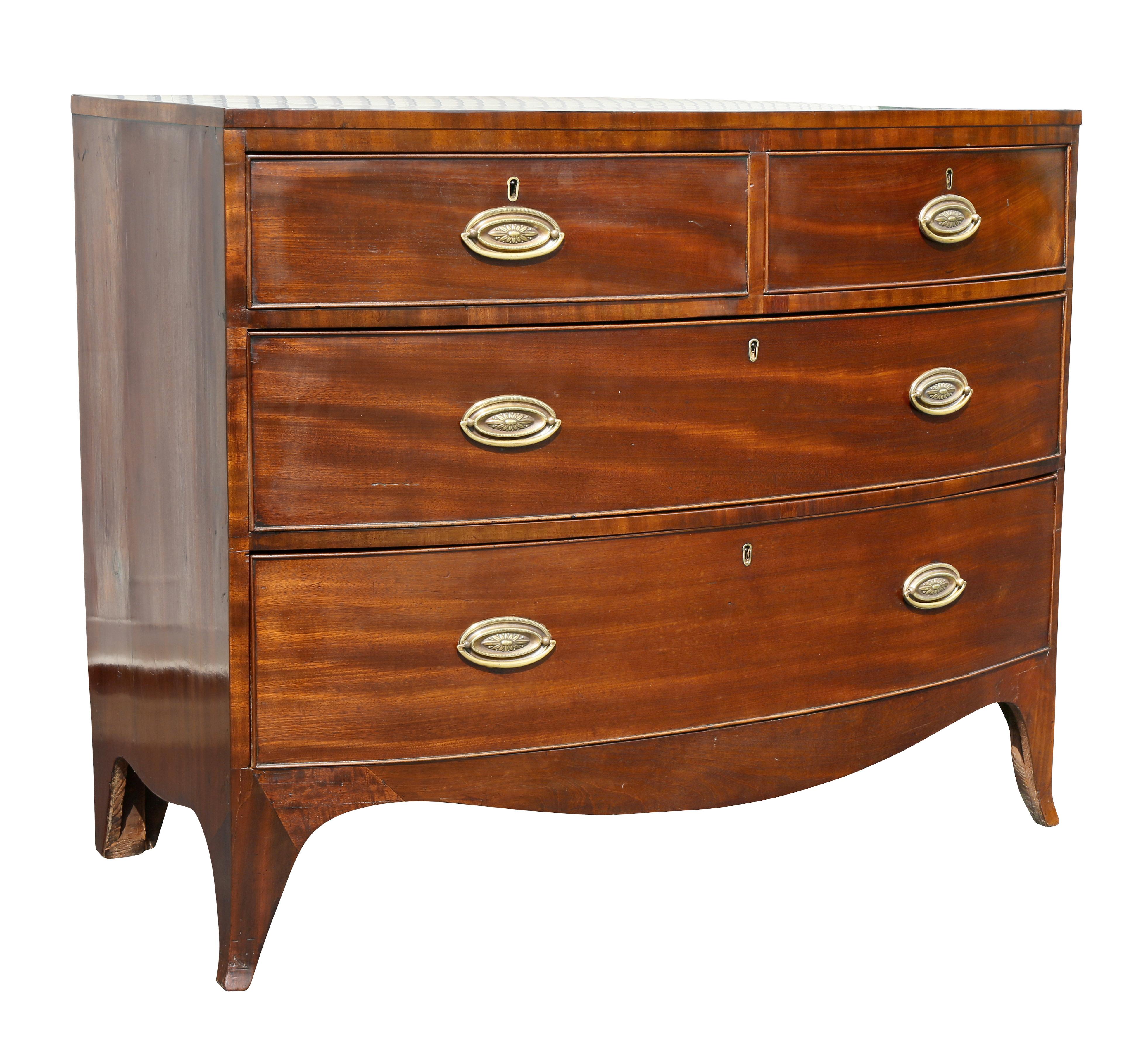 With rectangular top with bowed and crossbanding. Two drawers over two drawers raised on splayed feet.