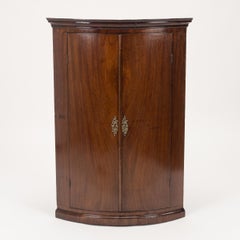 George III Mahogany Bow-Front Hanging Corner Cupboard with Spice Drawers
