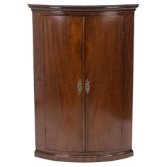 George III Mahogany Bow-Front Hanging Corner Cupboard with Spice Drawers