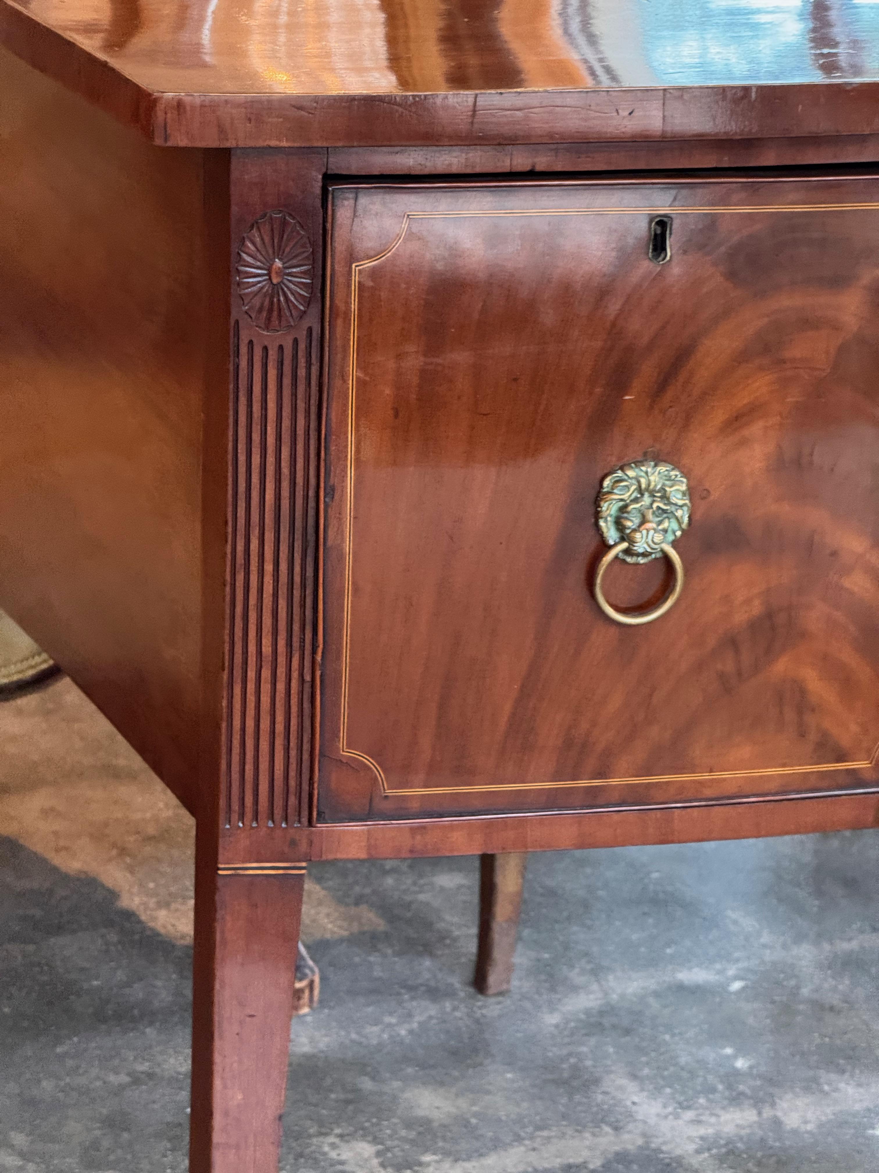 George III Mahogany Bowfront Sideboard With Lion Mask Pulls In Good Condition In Charlottesville, VA