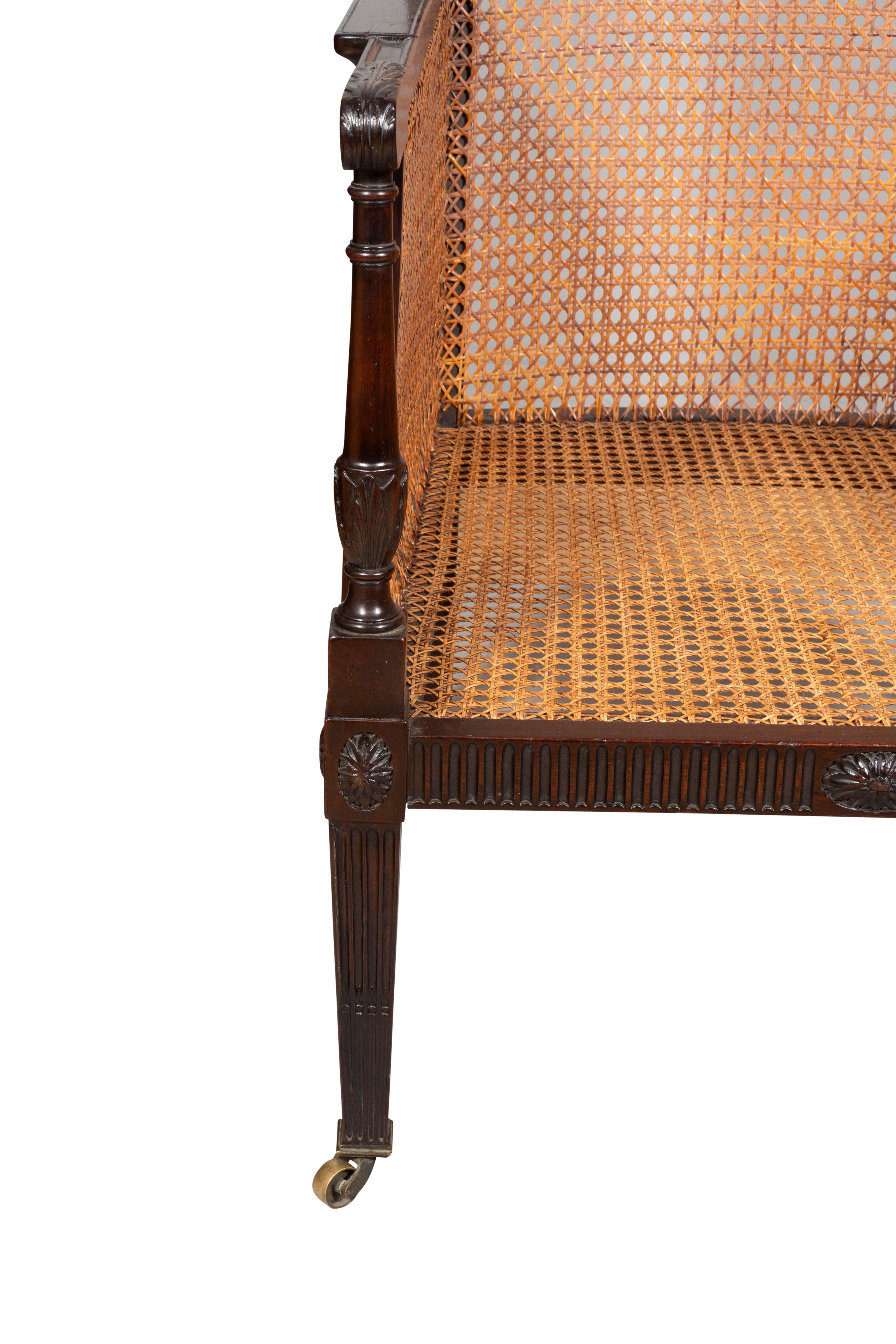 Early 19th Century George III Mahogany Caned Bergere For Sale