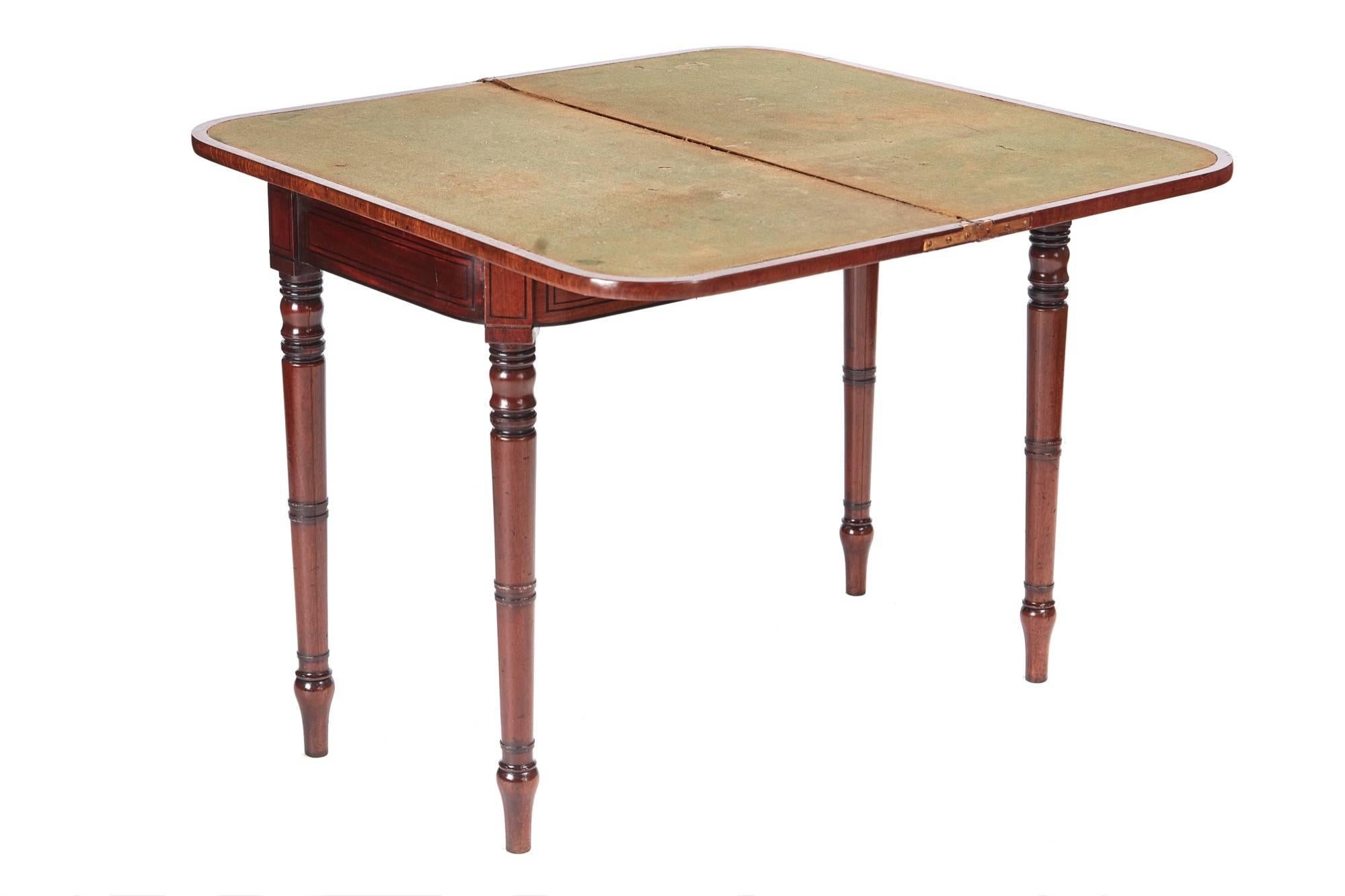 George III mahogany card table, with a lovely inlaid mahogany top, original green baize, inlaid frieze, standing on four lovely turned legs
Lovely color and condition
Measure: 30