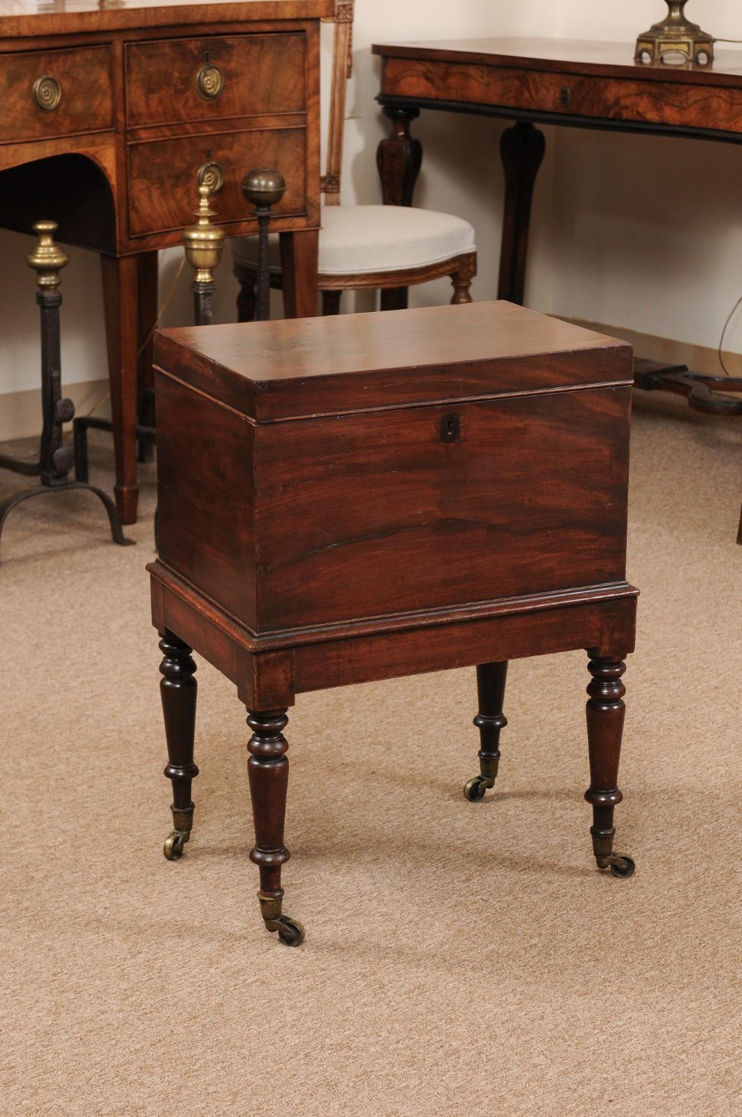 George III Mahogany Cellarette on stand, England early 19th century.