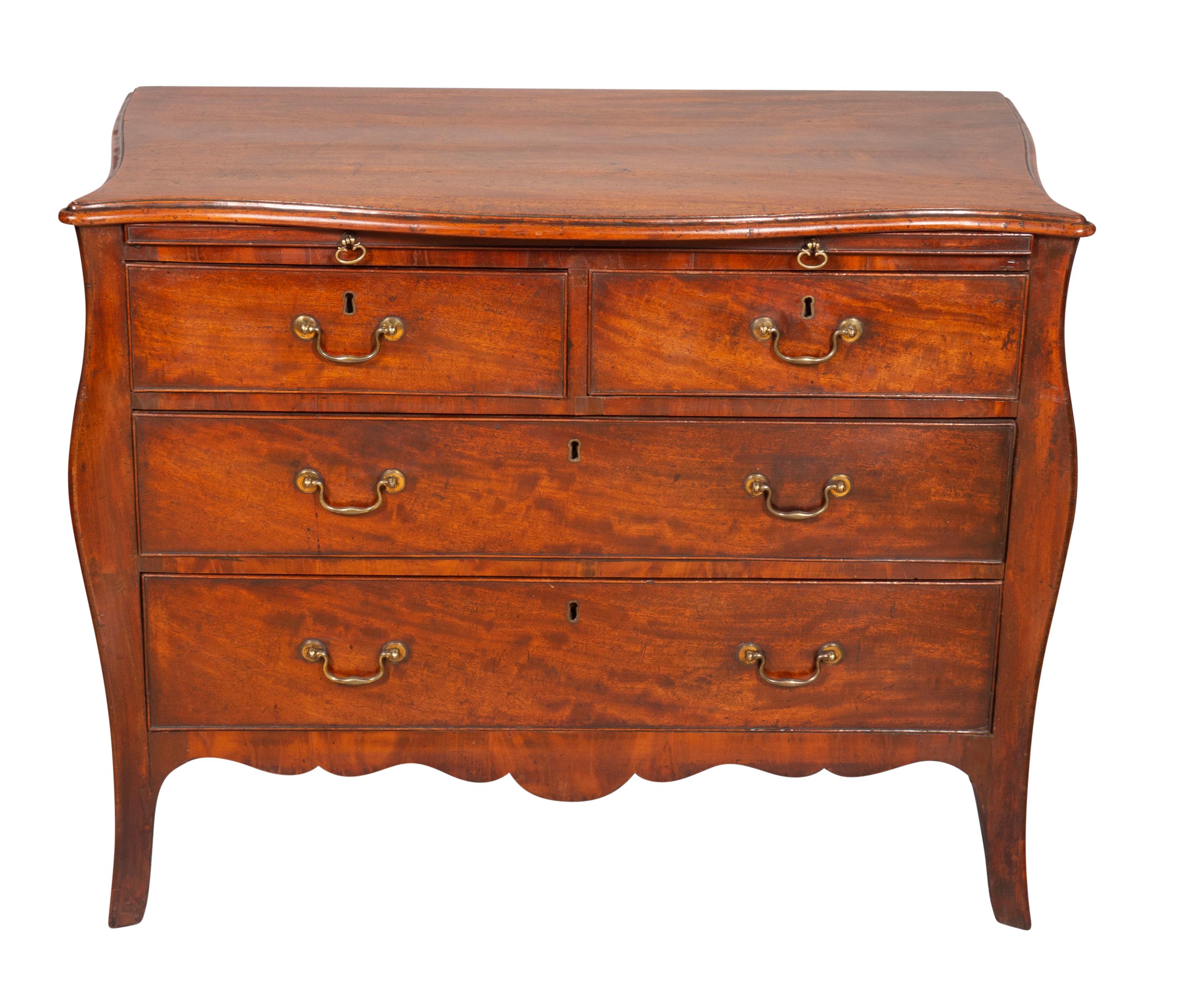 With a serpentine top over a brushing slide over two over two drawers , shaped apron and raised on splayed bracket feet. This chest is of the finest quality of color and scale and construction.