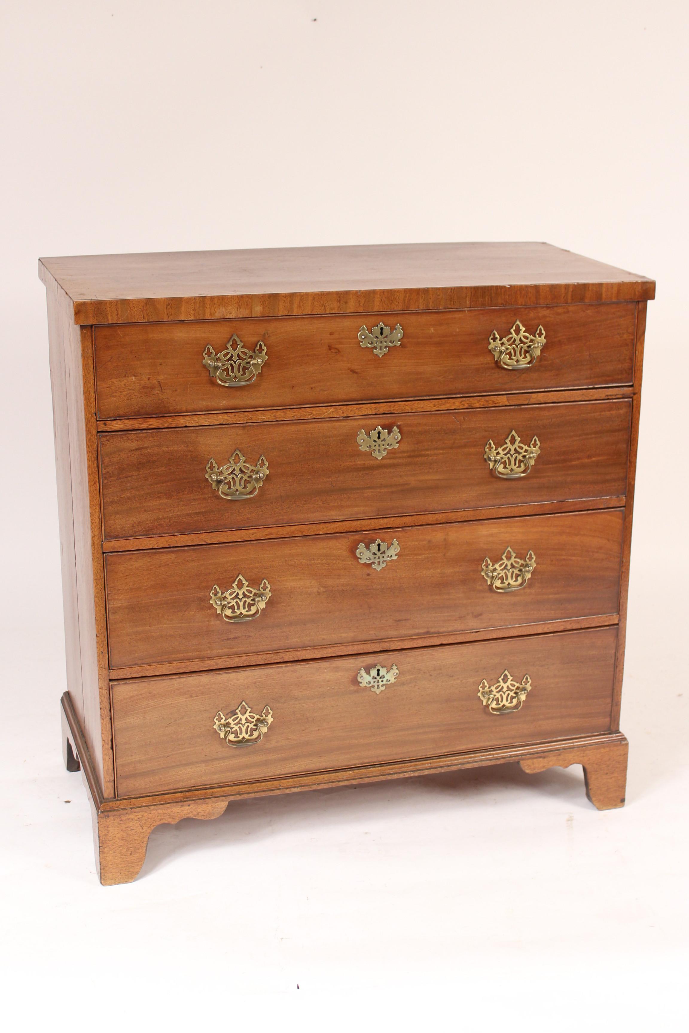 George III mahogany chest of drawers with brass hardware, circa 1800. Nice light colored mahogany. The brass hardware is stylistically appropriate but has been replaced.