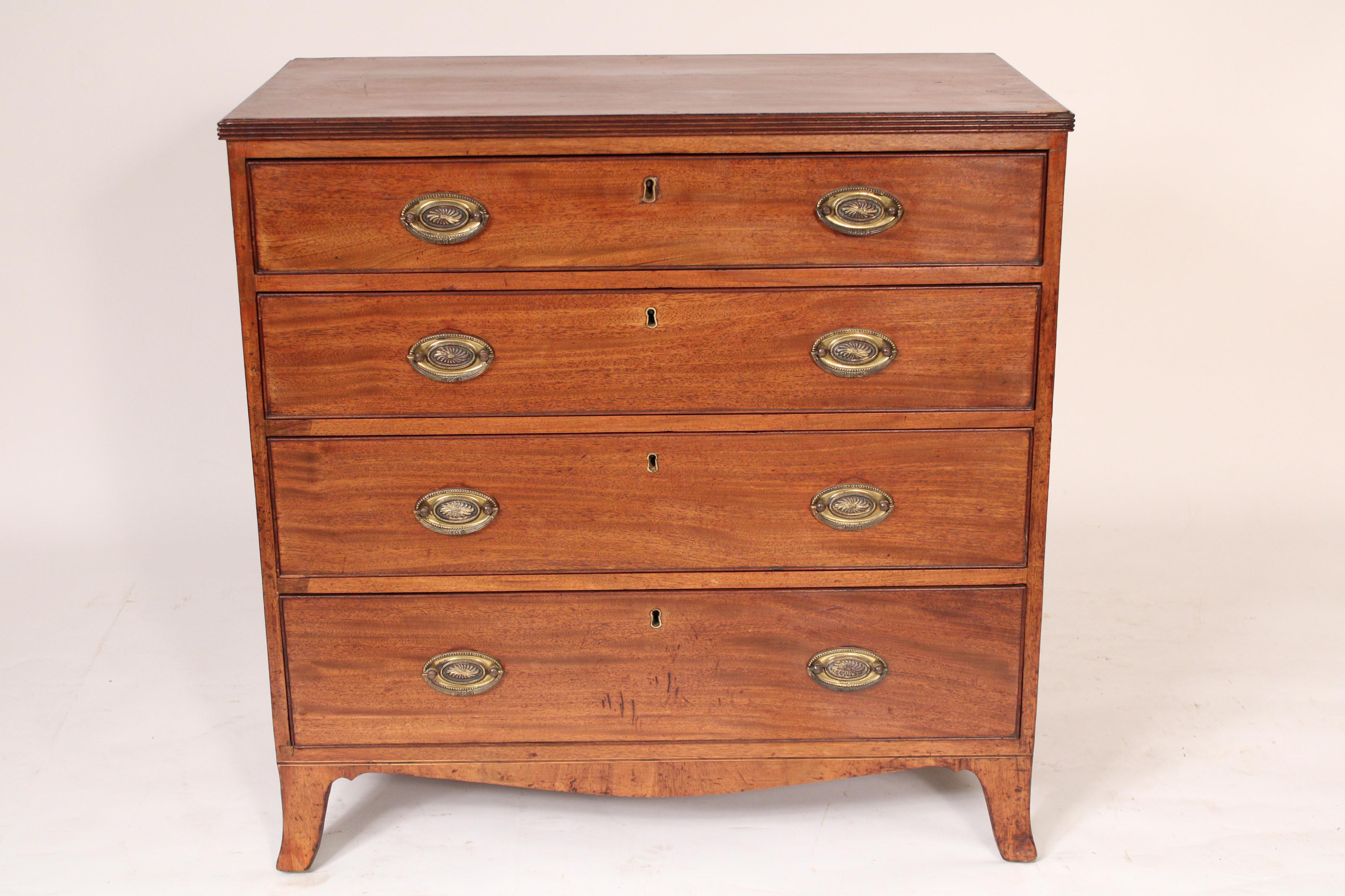 George III mahogany chest of drawers, circa 1800. With a rectangular top, front and side edges of top reeded, four graduated cock beaded drawers resting on splayed feet. Hand dove tailed drawer construction. Nice old color to the mahogany.