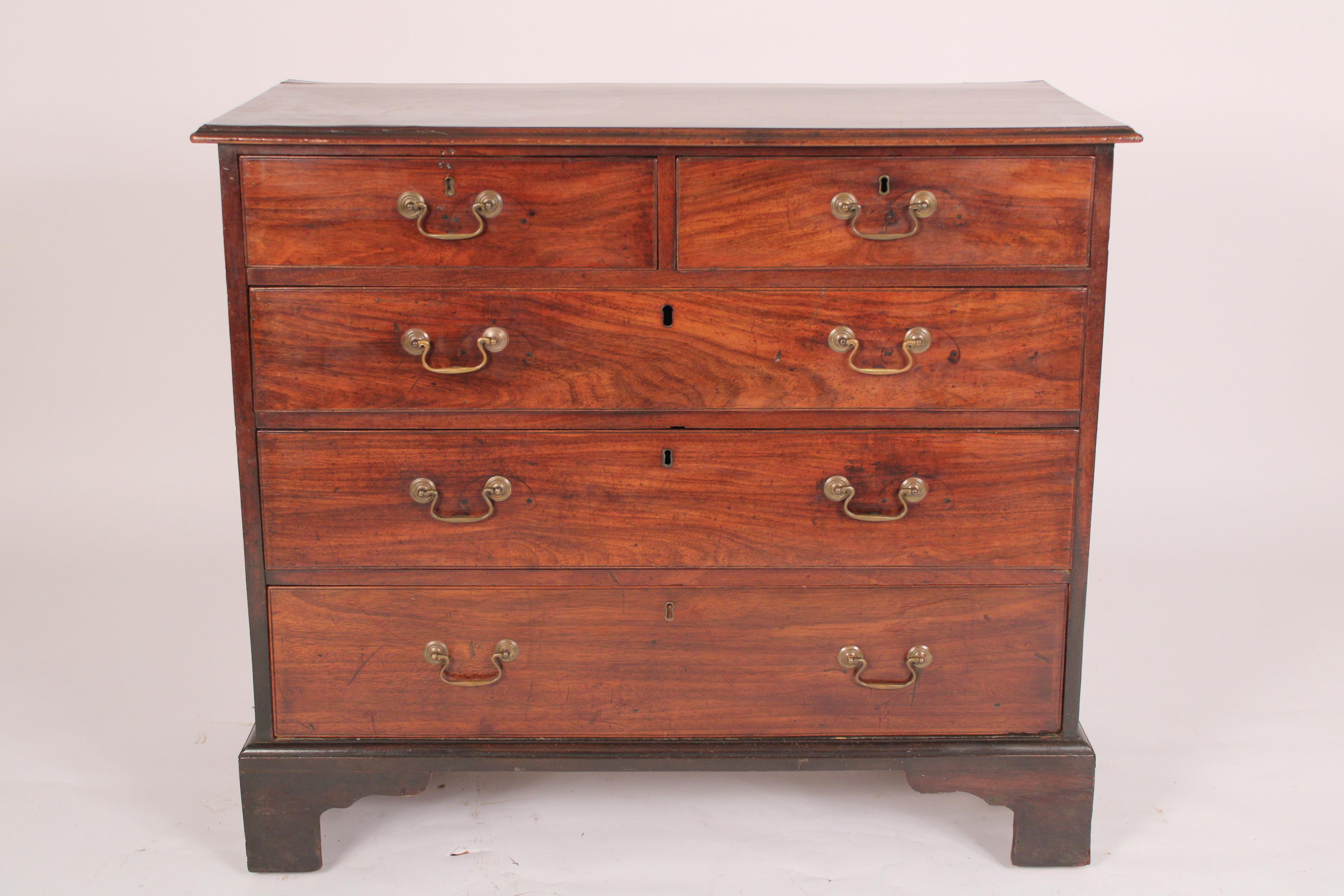 George III mahogany chest of drawers, 18th century with restorations. Having a rectangular two board top with thumb molded front and side edges, two top drawers and 3 lower drawers, resting on bracket feet. Formerly sold by Richard Gorham Antiques,