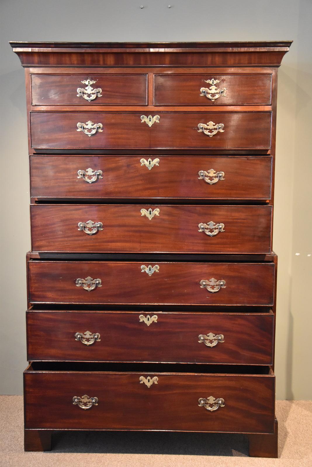 George III mahogany chest on chest on original bracket feet, replaced brass handles and escutcheons.

Dimensions:
Height 68.5
