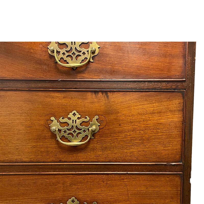 George III mahogany chest on chest, the projecting molded and dentil cornice over plain frieze, fitted with two short and six graduating drawers with oak linings, on bracket feet