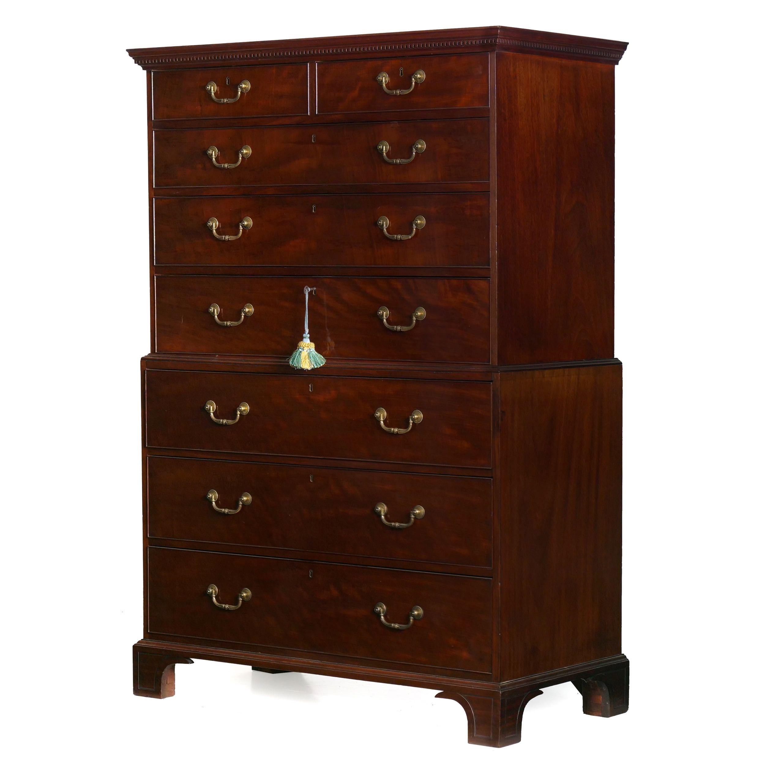 The selection of rich mahogany timbers for the drawers is notable with golden currents of grain swell that glow beautifully against the scarlet hue of the darker grain patterns. There is a sense of excellence and careful choice in every element of