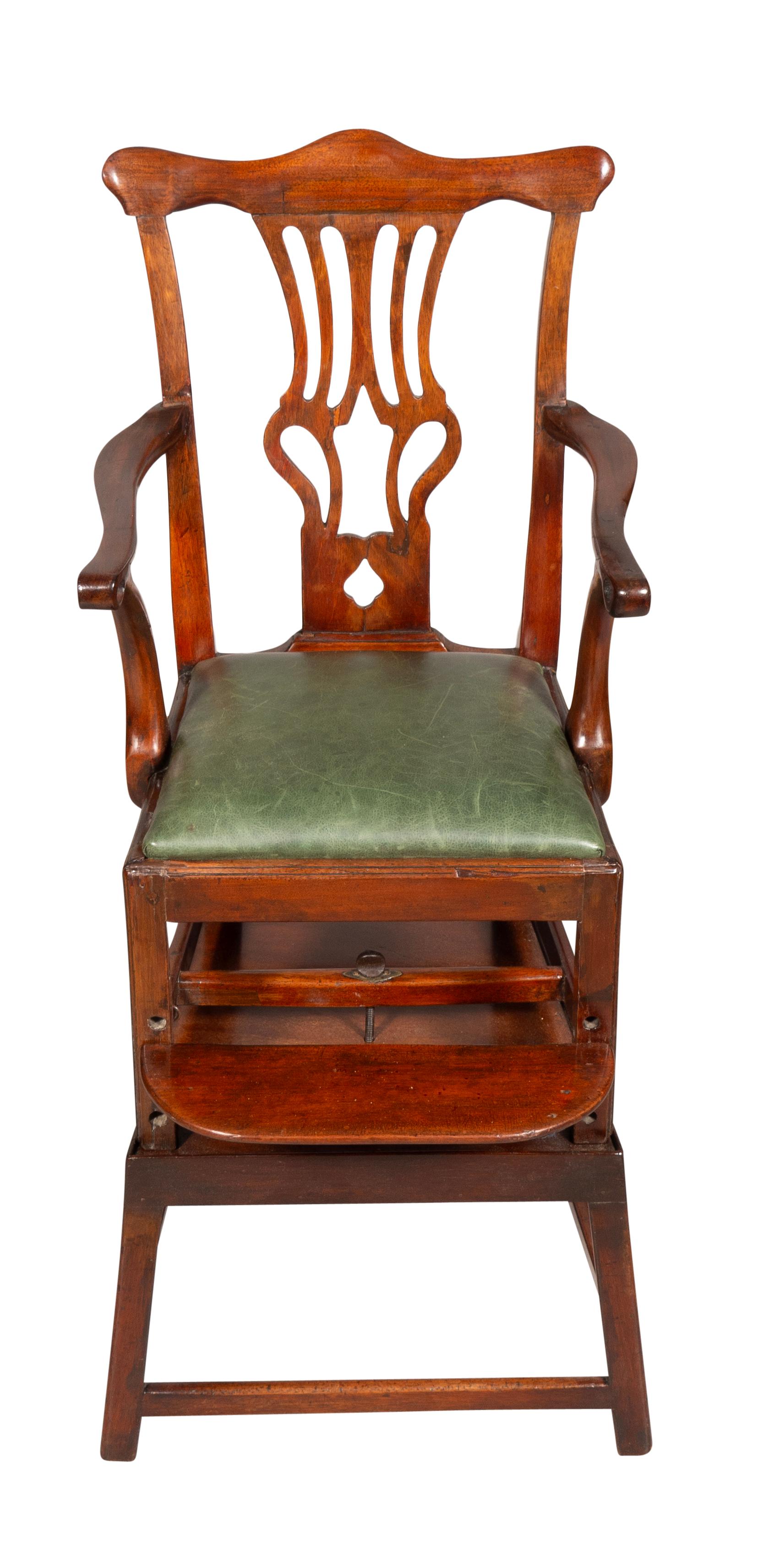 With serpentine crest rail over a pierced splat, drop in seat, square legs and stretcher and foot rest. Raised on a base with square section legs.