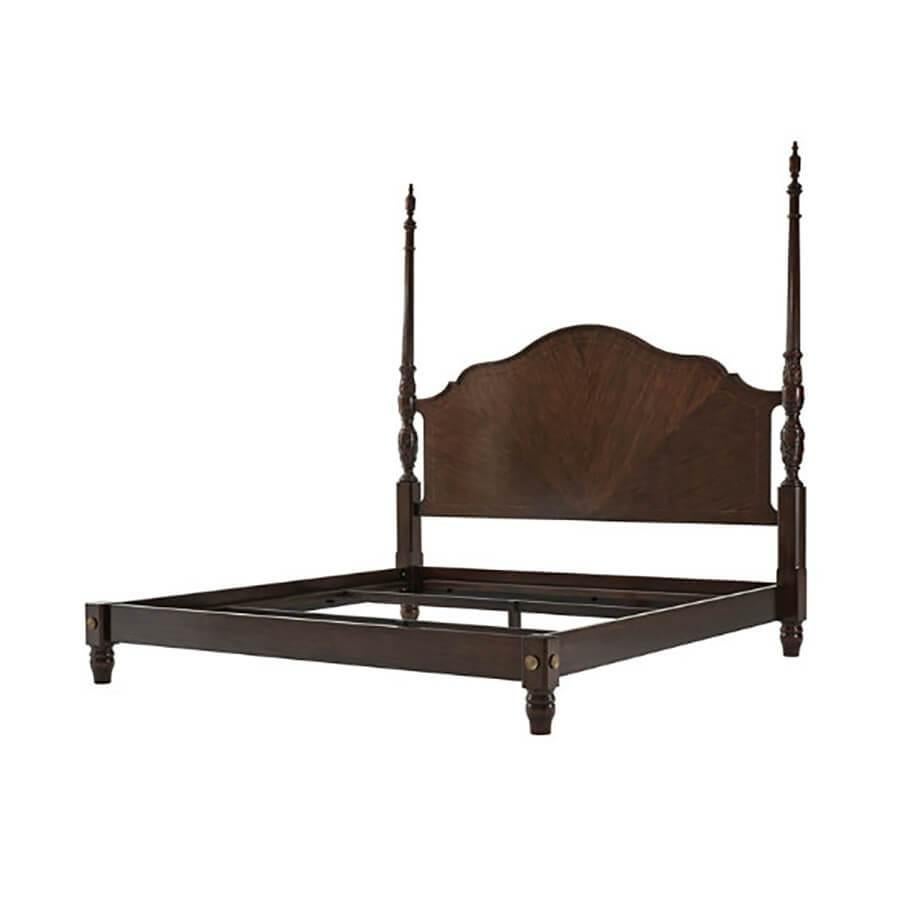 A George III style king size bed with a sycamore line inlaid serpentine headboard, carved column posts, plain rails with bronze roundels and turned feet.

Dimensions: 86