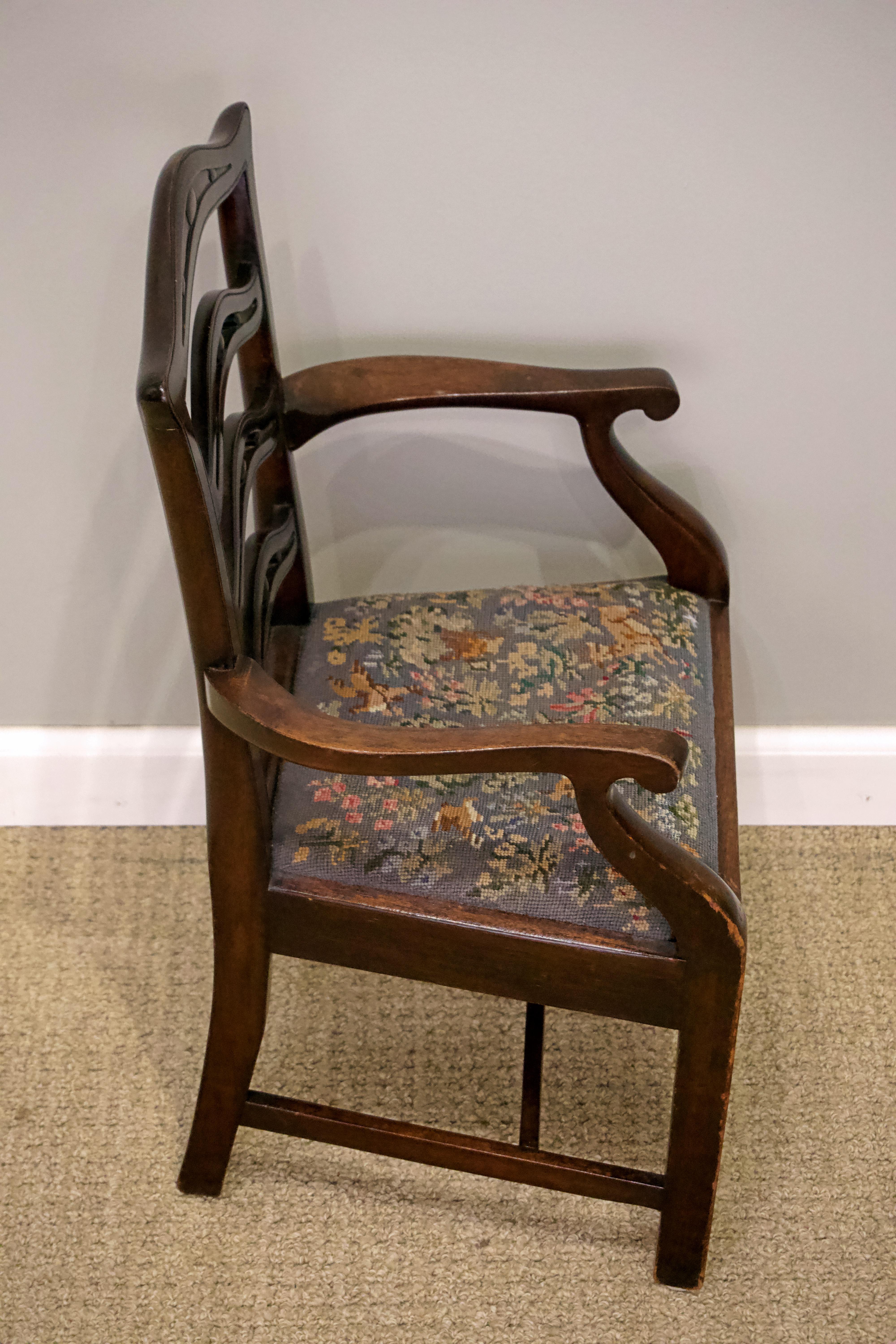 George III mahogany ladder back child's armchair, seat and needlework contemporary with period.