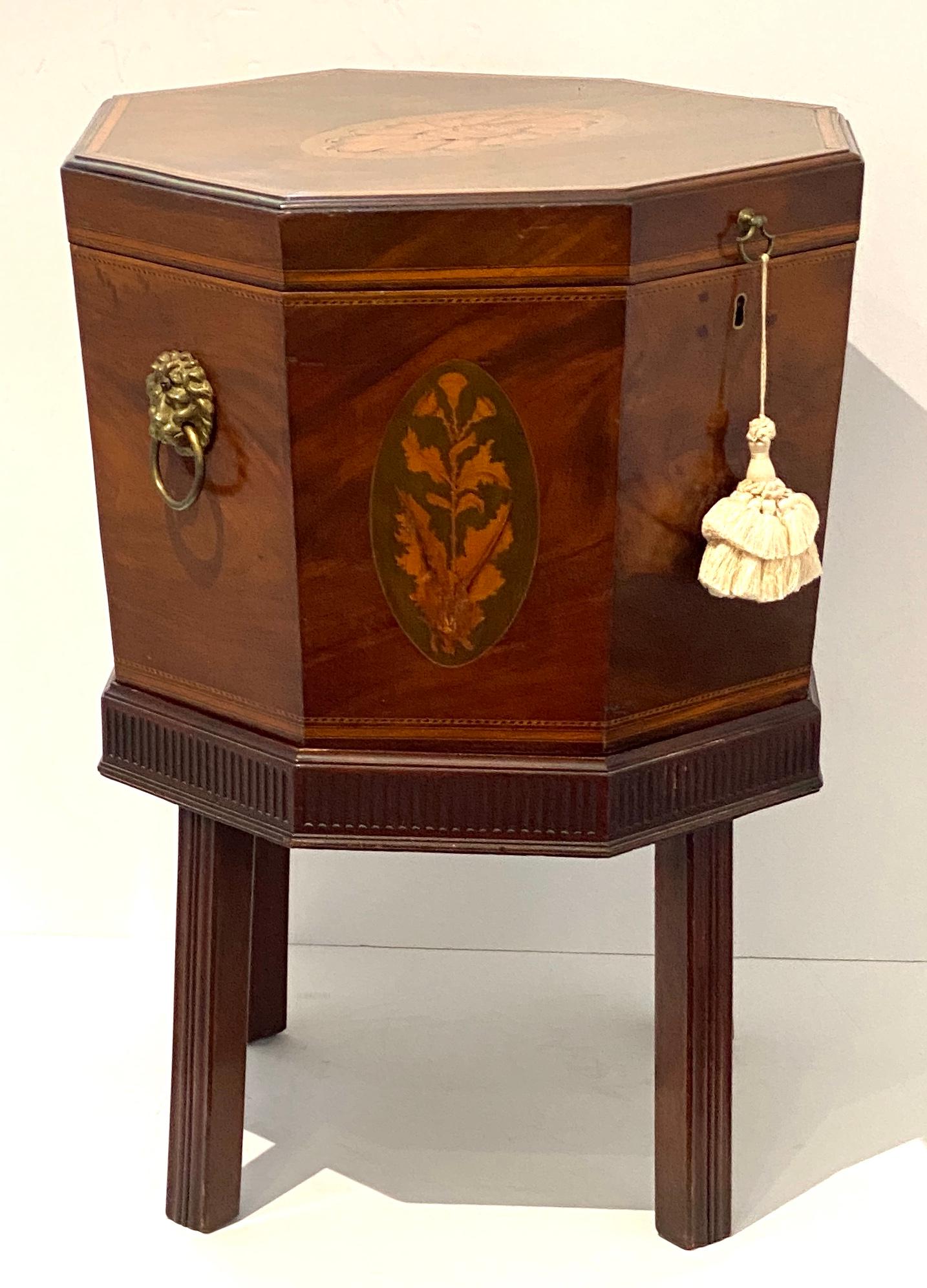 This stylish, 19th century, English hand-crafted George III wine cellarette-on-stand was acquired from an estate in Albany, NY. 

Note: Overall dimensions are 28