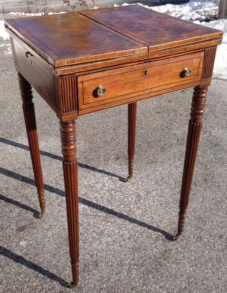 Period Georgian writing table and side table

--Sheraton form
--Top opens to reveal original leather writing surface
--Interior with secondary tilted writing area and ink wells.