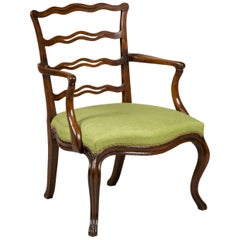 George III Mahogany Open Armchair with a Decorative Serpentine Ladder Back