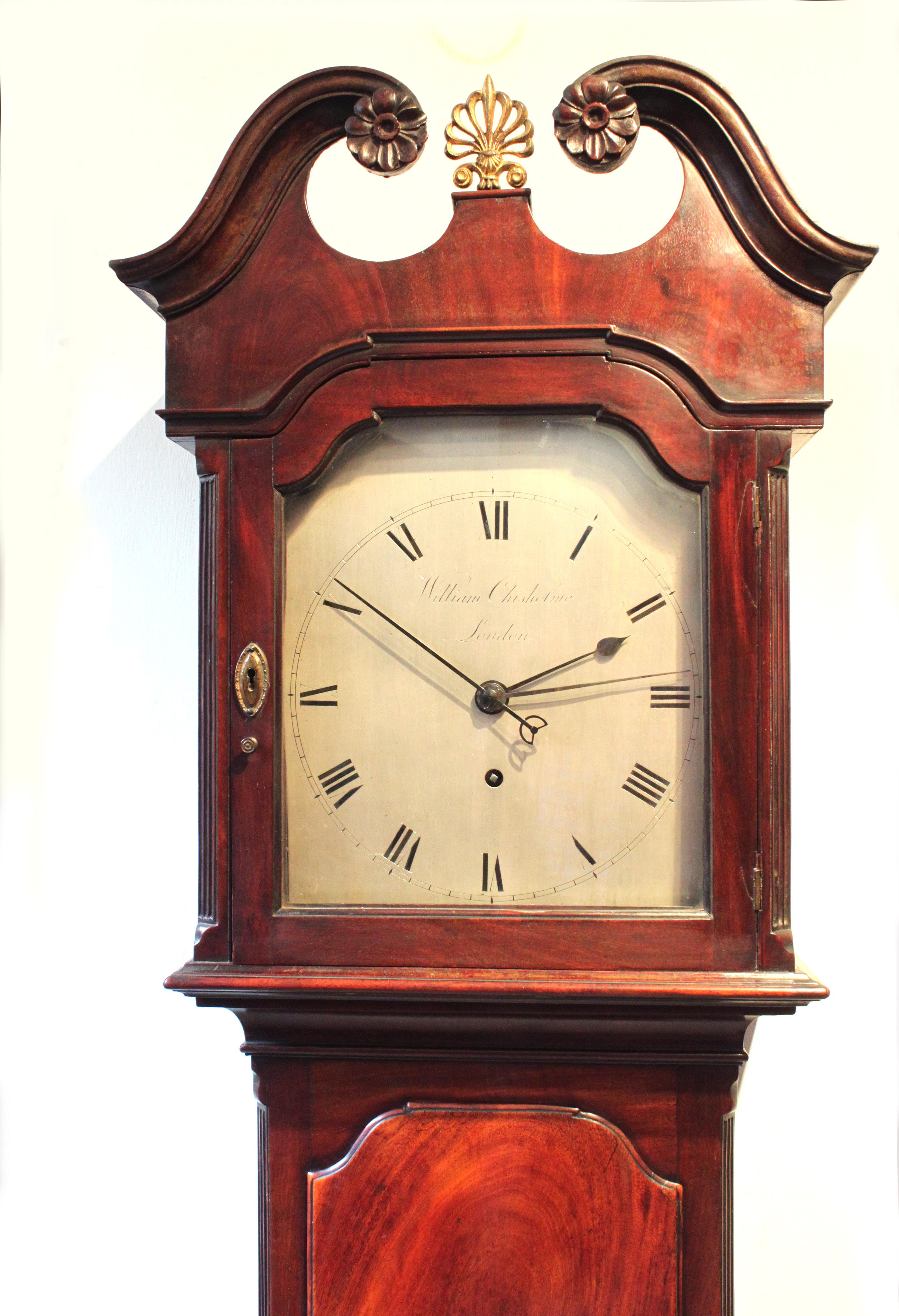 A Regulator clock by William Chisholm, London. Baillie has no record of the maker but by the design of its original case, we believe it to be late 18th century circa 1790. The 8 day movement has just been cleaned and restored and is in good working