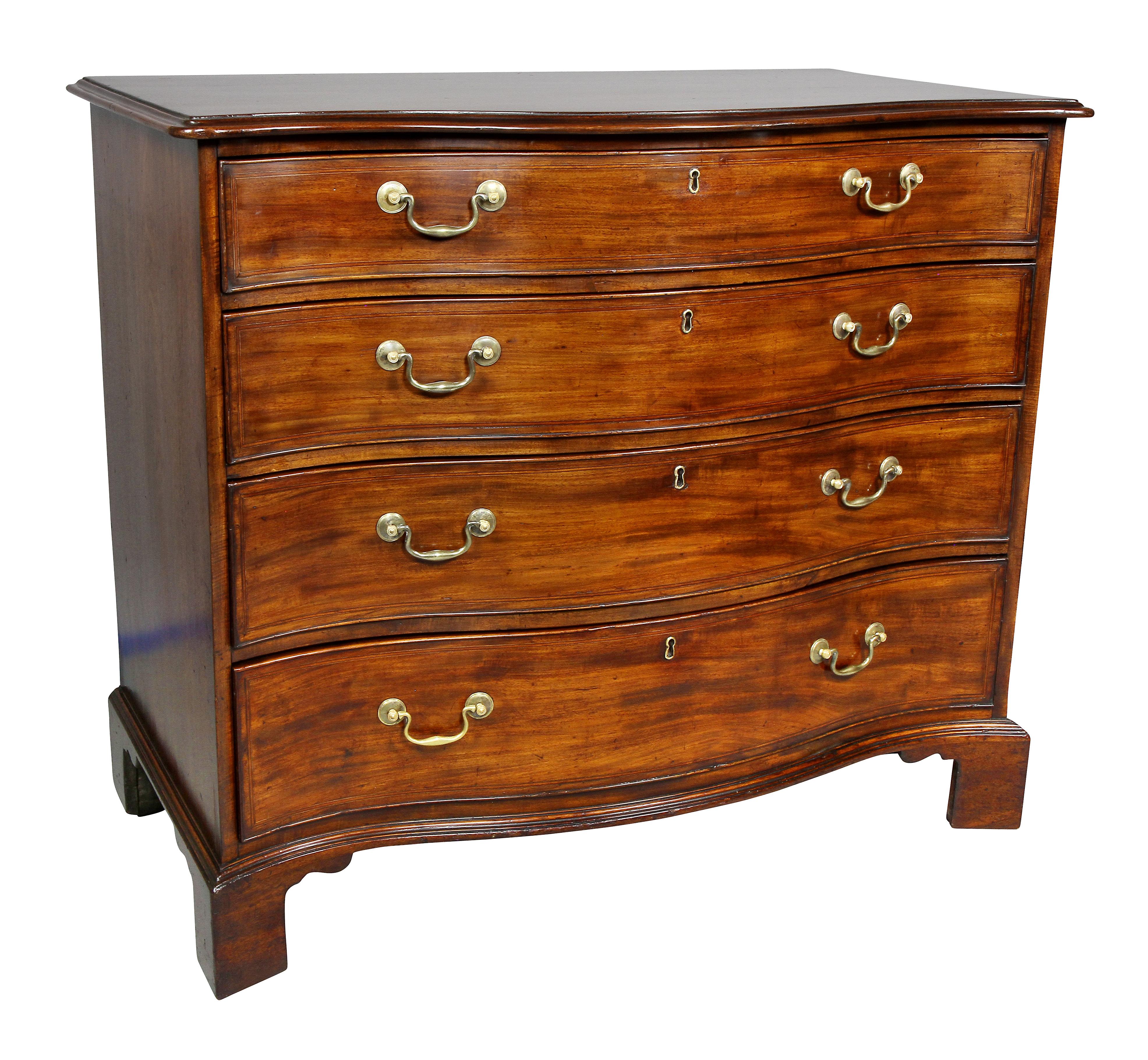 With serpentine shaped top over conforming case section containing four graduated string inlaid drawers all with brass bail handles, bracket feet.