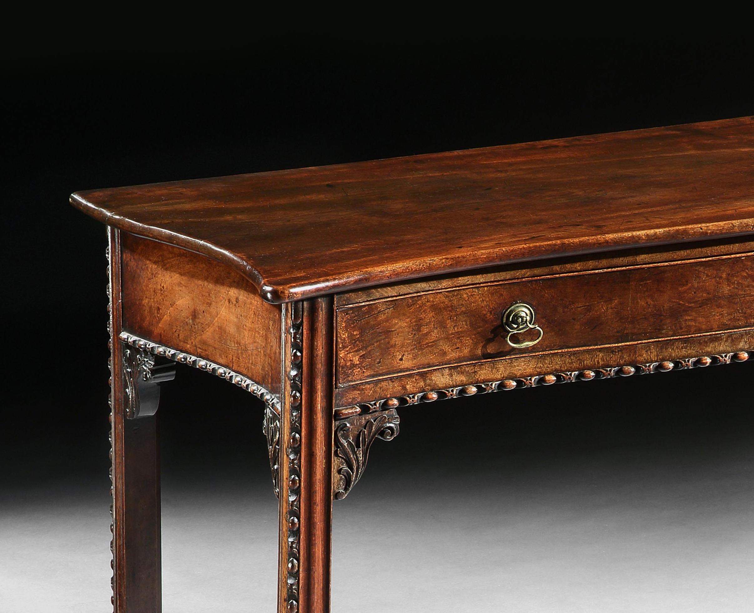 Carved George III Mahogany Serpentine Side Table in the Manner of Wright & Elwick