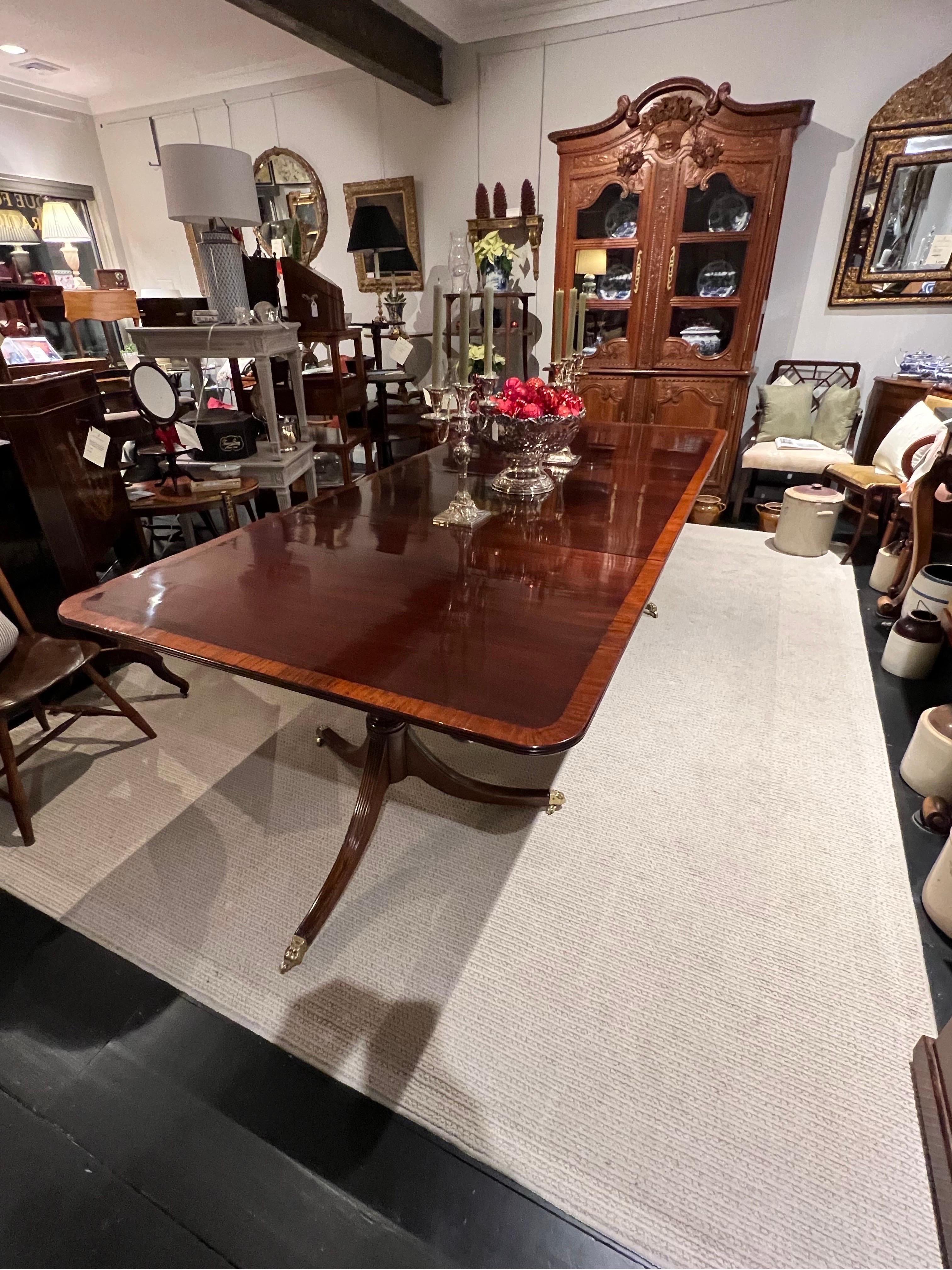 George Iii Mahogany Three pedestal Dining Table with 2 leaves,
and all clips 