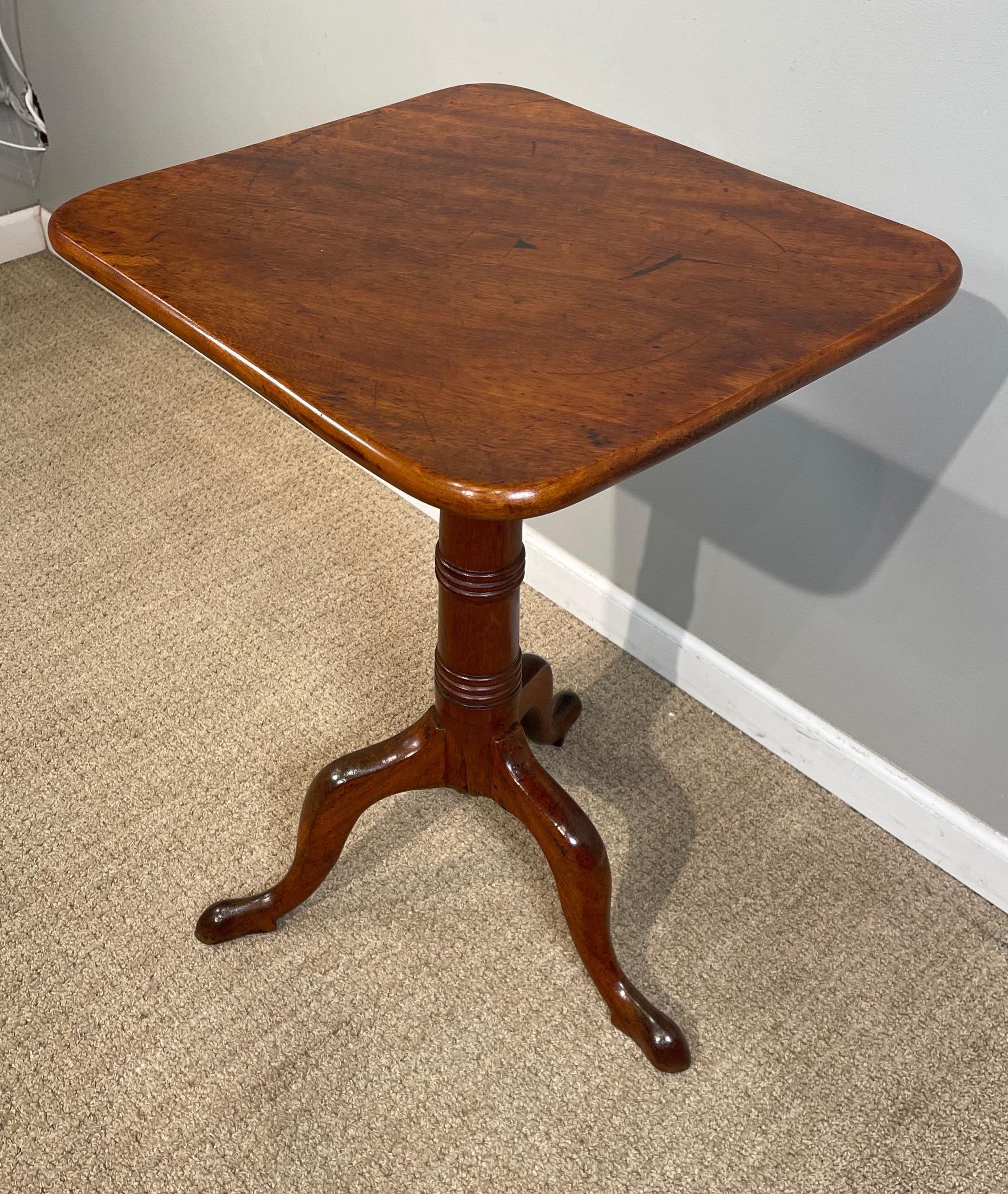 George III mahogany tilt-top tripod table.