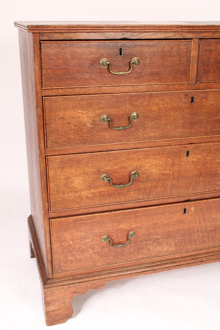 Brass George III Oak Chest of Drawers For Sale