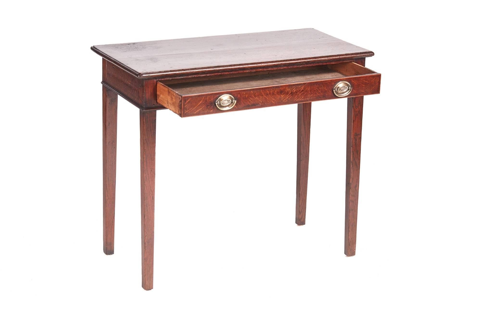 George III oak side / lamp table, with a lovely oak top, one long drawer to the frieze crossbanded in walnut, standing on four square tapering legs, lovely color.