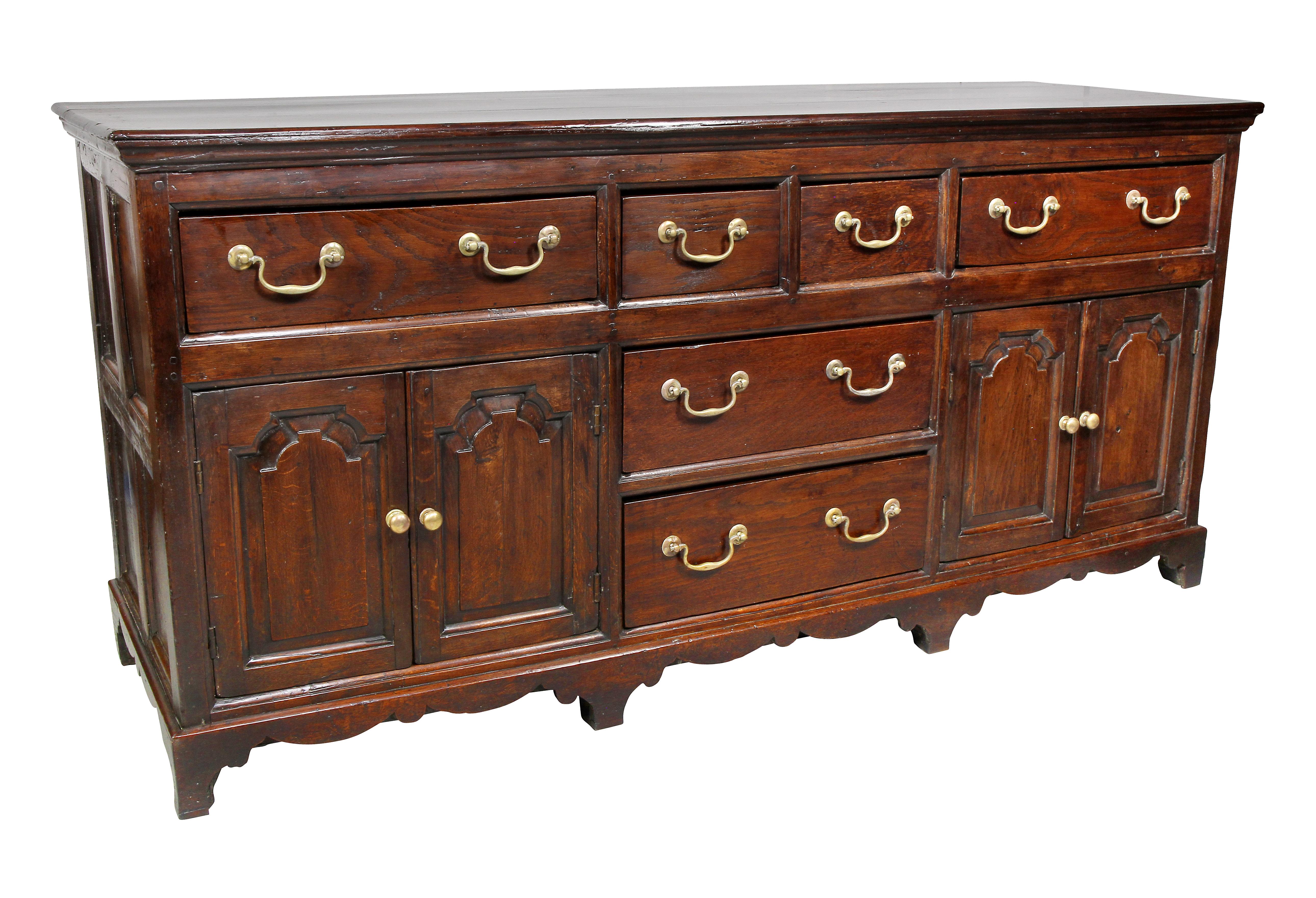 Rectangular top over four drawers over two drawers flanked by a pair of cabinet doors. Estate of John Volk, Palm Beach Fl.