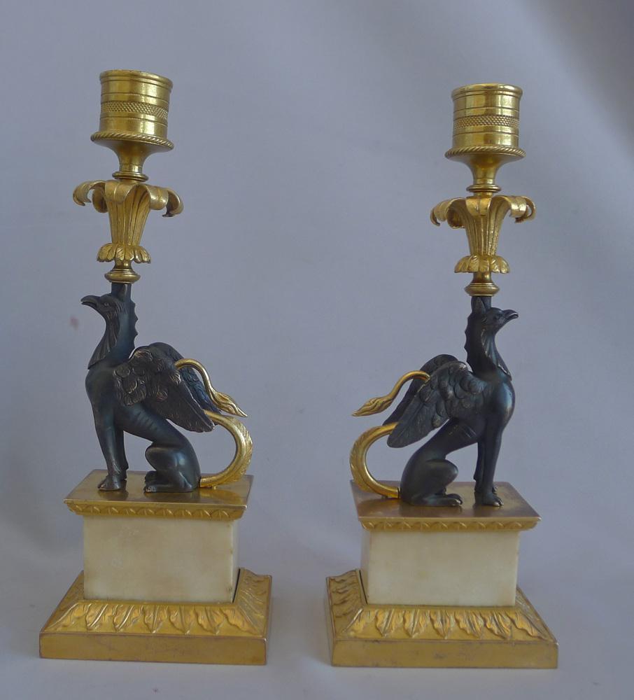 Antique pair of George III Ormolu and marble Chambers pattern Griffin Candlesticks. In the famous William Chambers pattern. Sir William Chambers was the court architect to George III and produced many designs for Matthew Boulton. These are a lovely