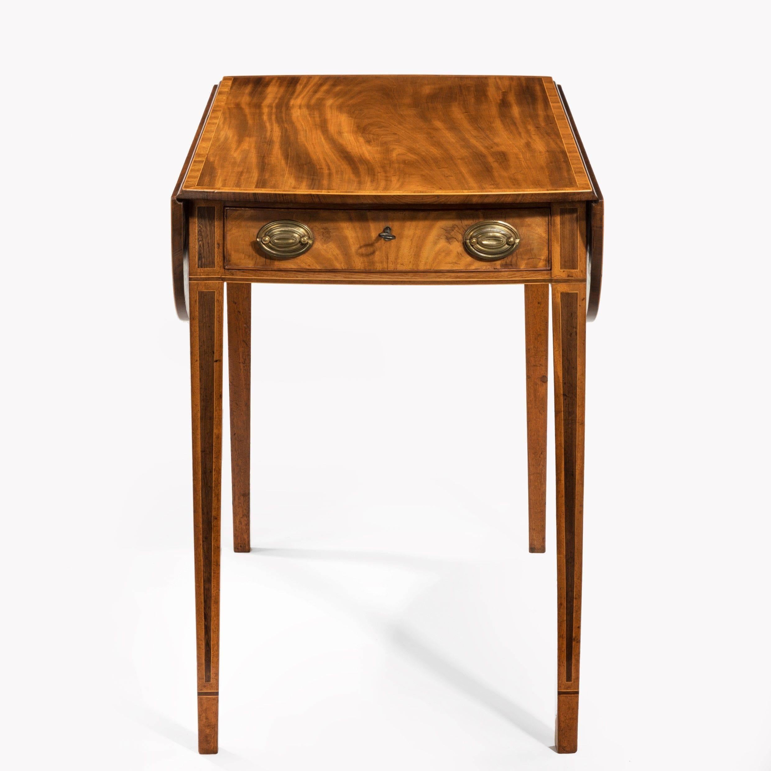 George III oval mahogany and king wood banded Pembroke table of lovely color. The centre panel is banded in kingwood as are the two flaps. 

The whole raised on square tapering legs. 

Measure: H 28 3/4 
W open. 37 1/2 
Closed 18 1/2.