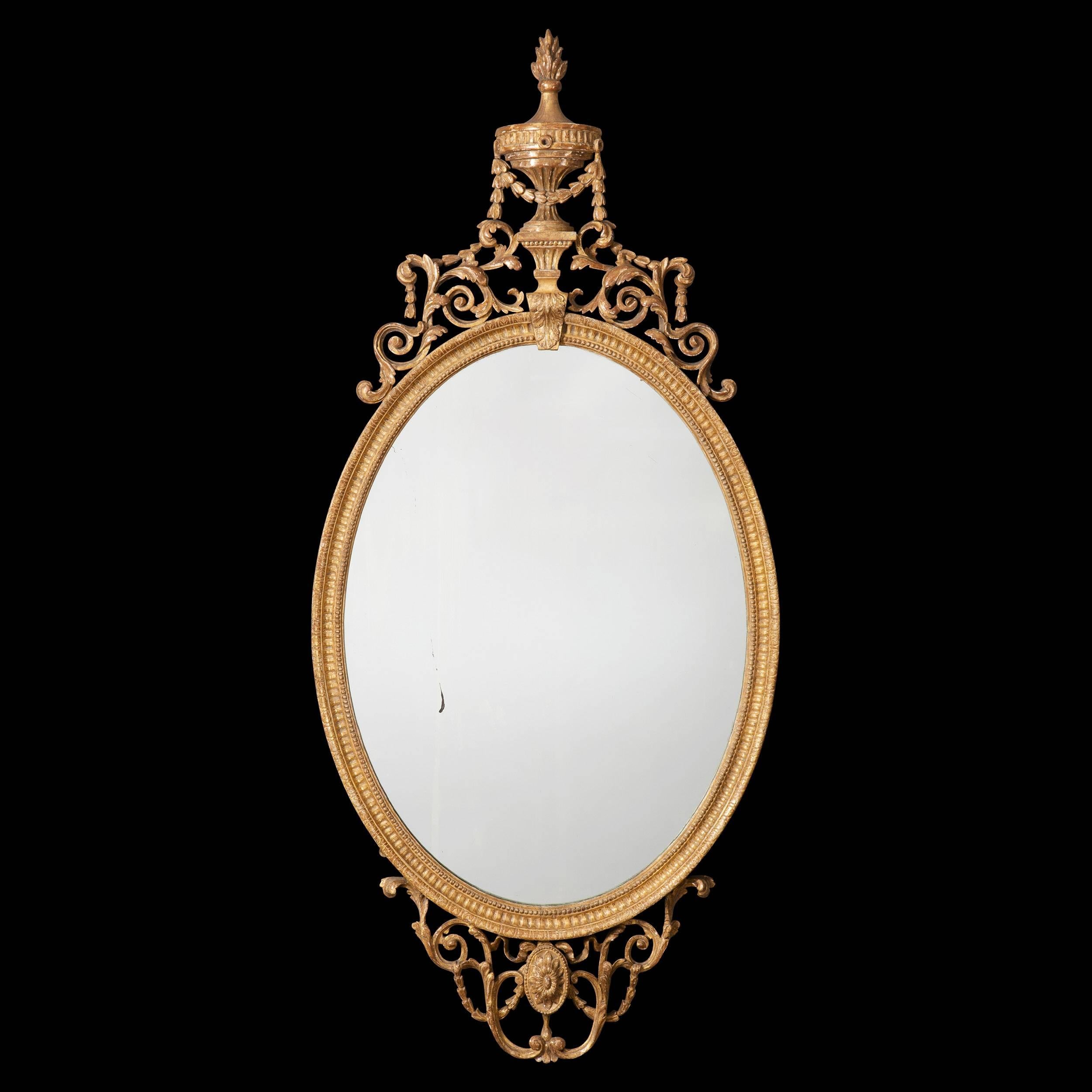 A George III oval mirror