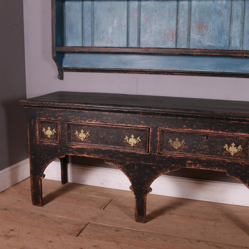 Stunning George III painted pine dresser with hanging rack. 1760.

Rack dimensions are 101.5W x 8D x 43.5H (shelf depth is 5