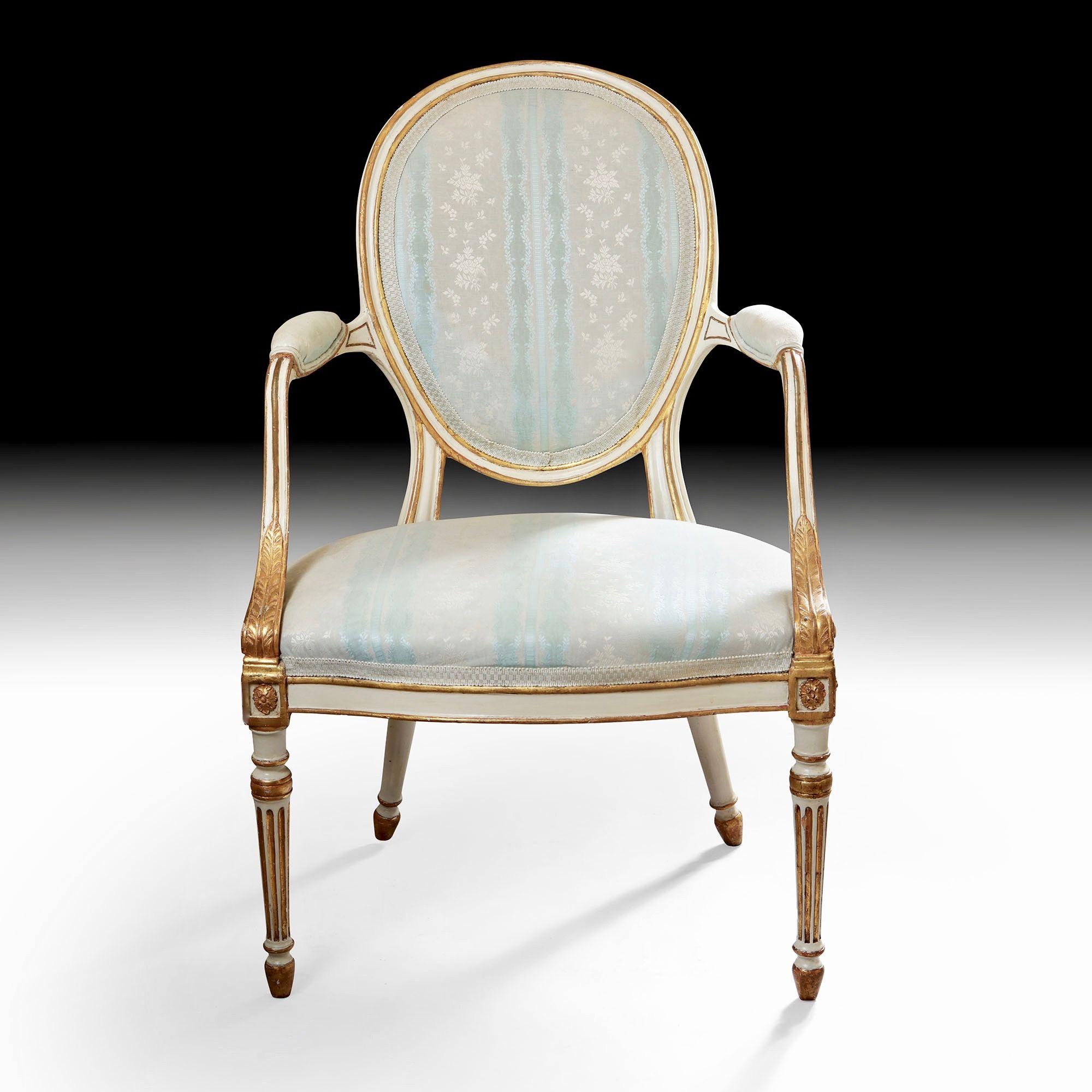 A Fine pair of painted and carved George III English chairs in the French taste, upholstered in silk damask. 
Possibly by John Linnell. 




Provenance: Private collection since the 1970s.


  