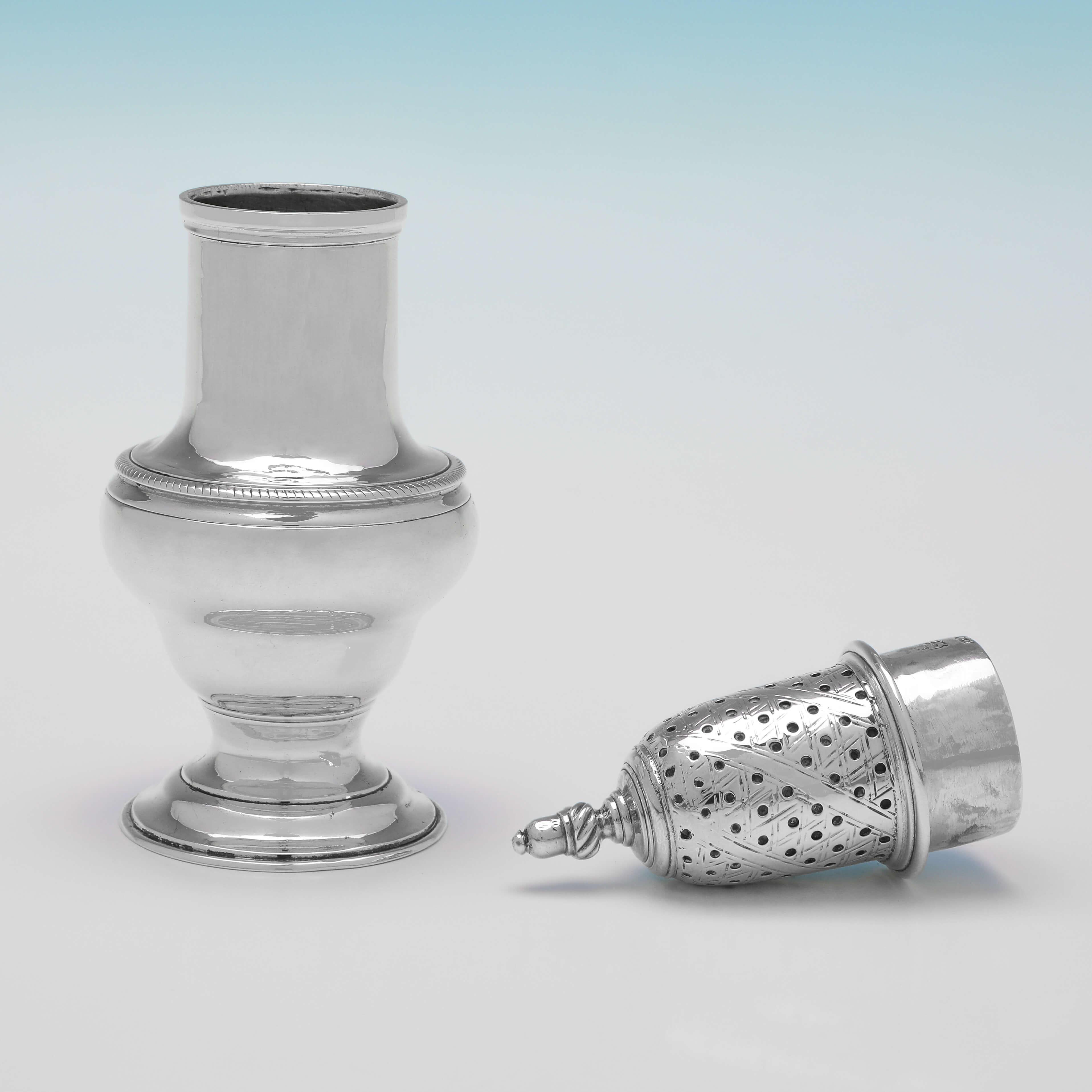 Hallmarked in London in 1764, this handsome, George III, antique sterling silver pepper pot, is of traditional form, and features both rope and reed borders. 

The pepper pot measures 5.5