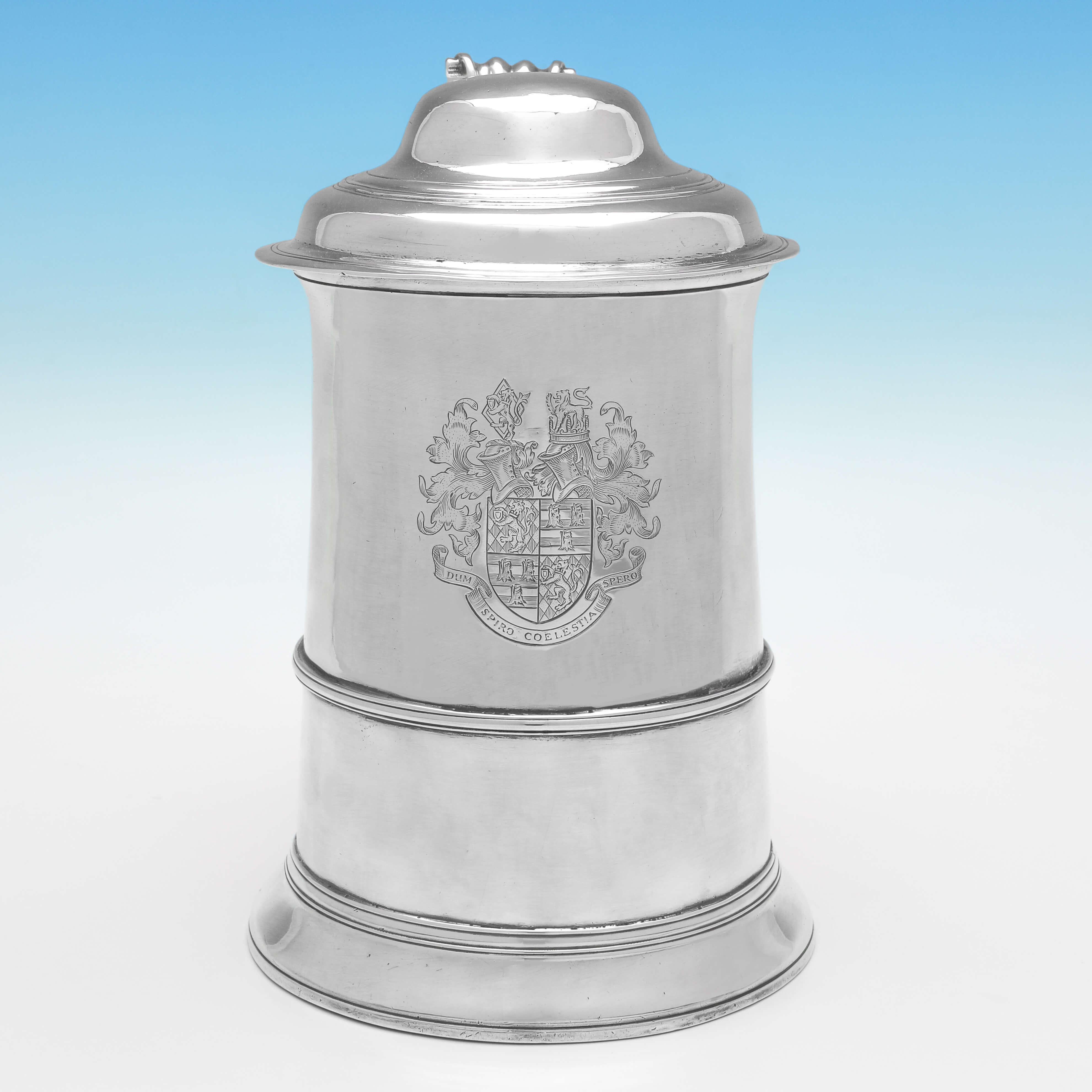 Hallmarked in London in 1774 by John King, this wonderful, George III period, Antique Sterling Silver Tankard, is of traditional straight sided form, and is engraved with a coat of arms opposite the handle. The tankard measures 7.5