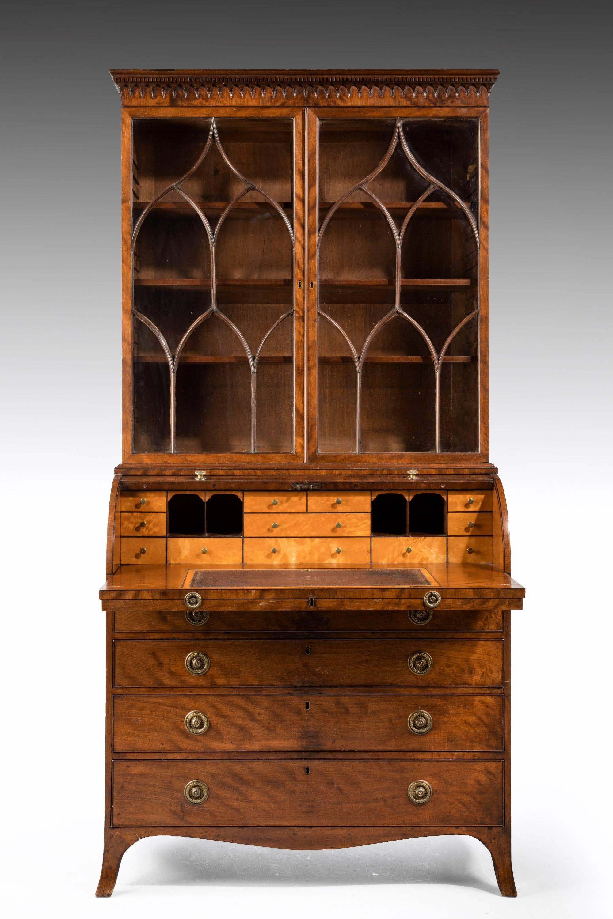 A quite exceptional George III period cylinder secretaire bookcase with fine Gothic tracery to the glazed doors.